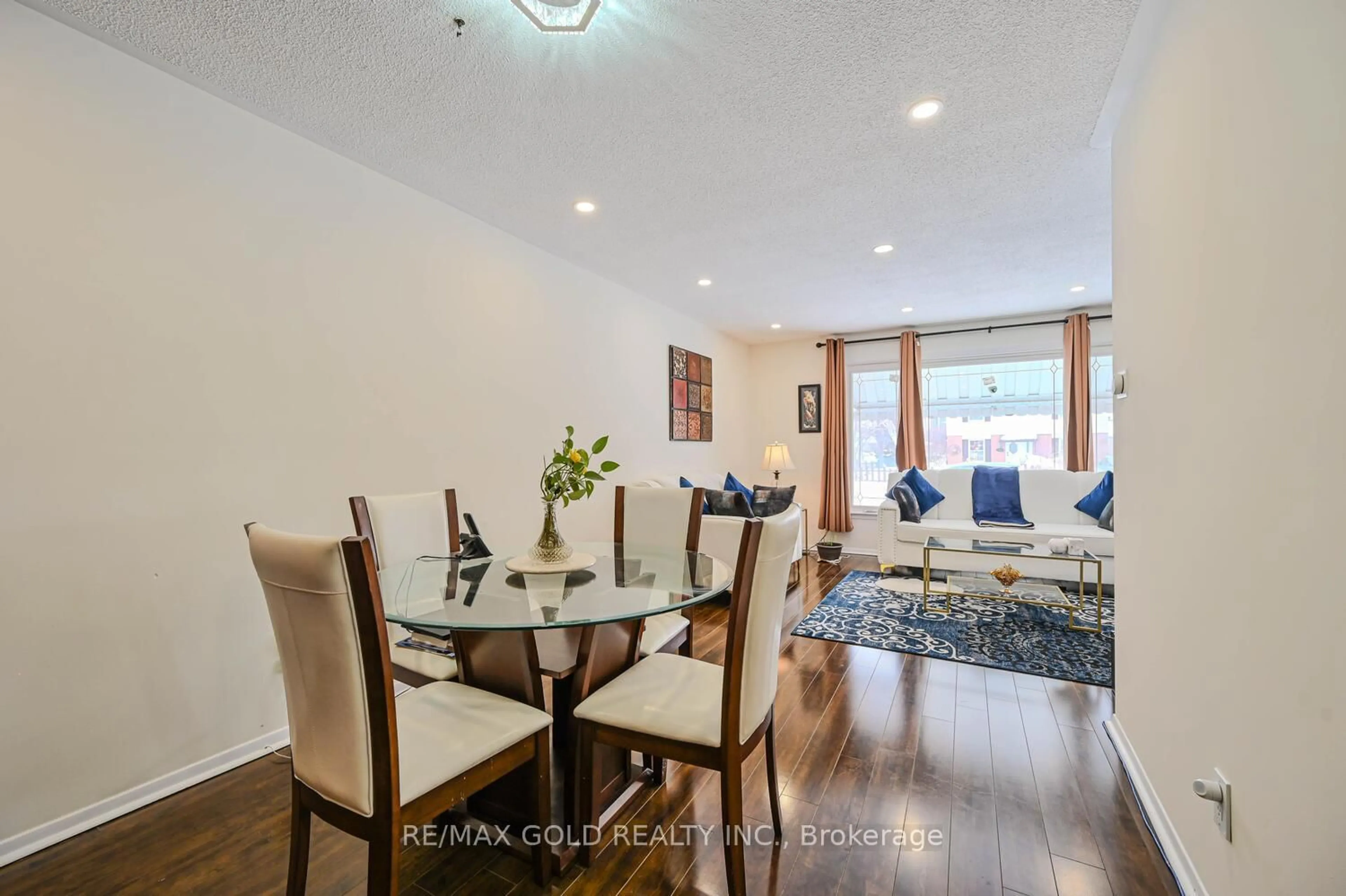 Dining room, wood/laminate floor for 29 Doncaster Dr, Brampton Ontario L6T 1S8