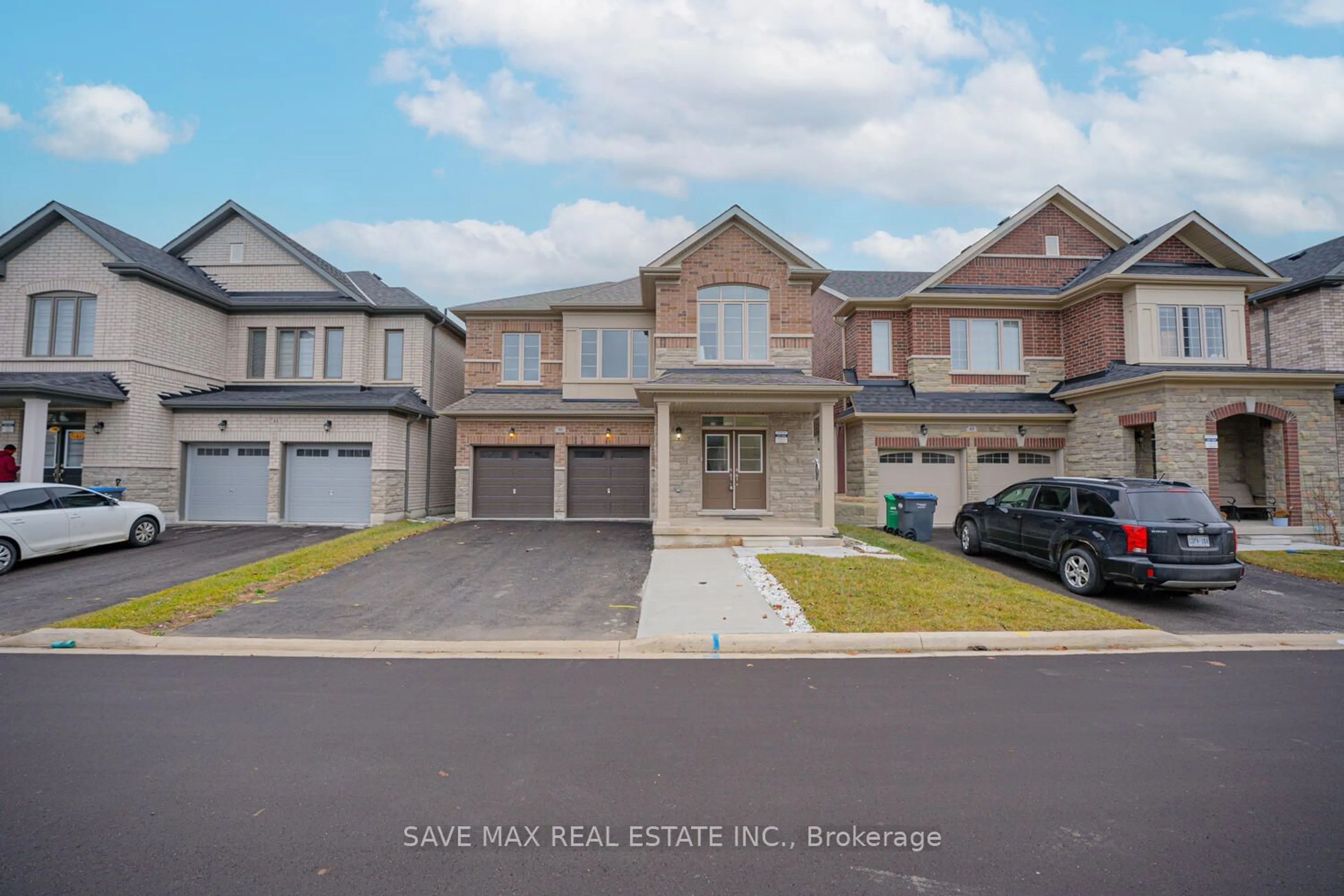 Home with brick exterior material, street for 46 Eastman Dr, Brampton Ontario L6X 5S5