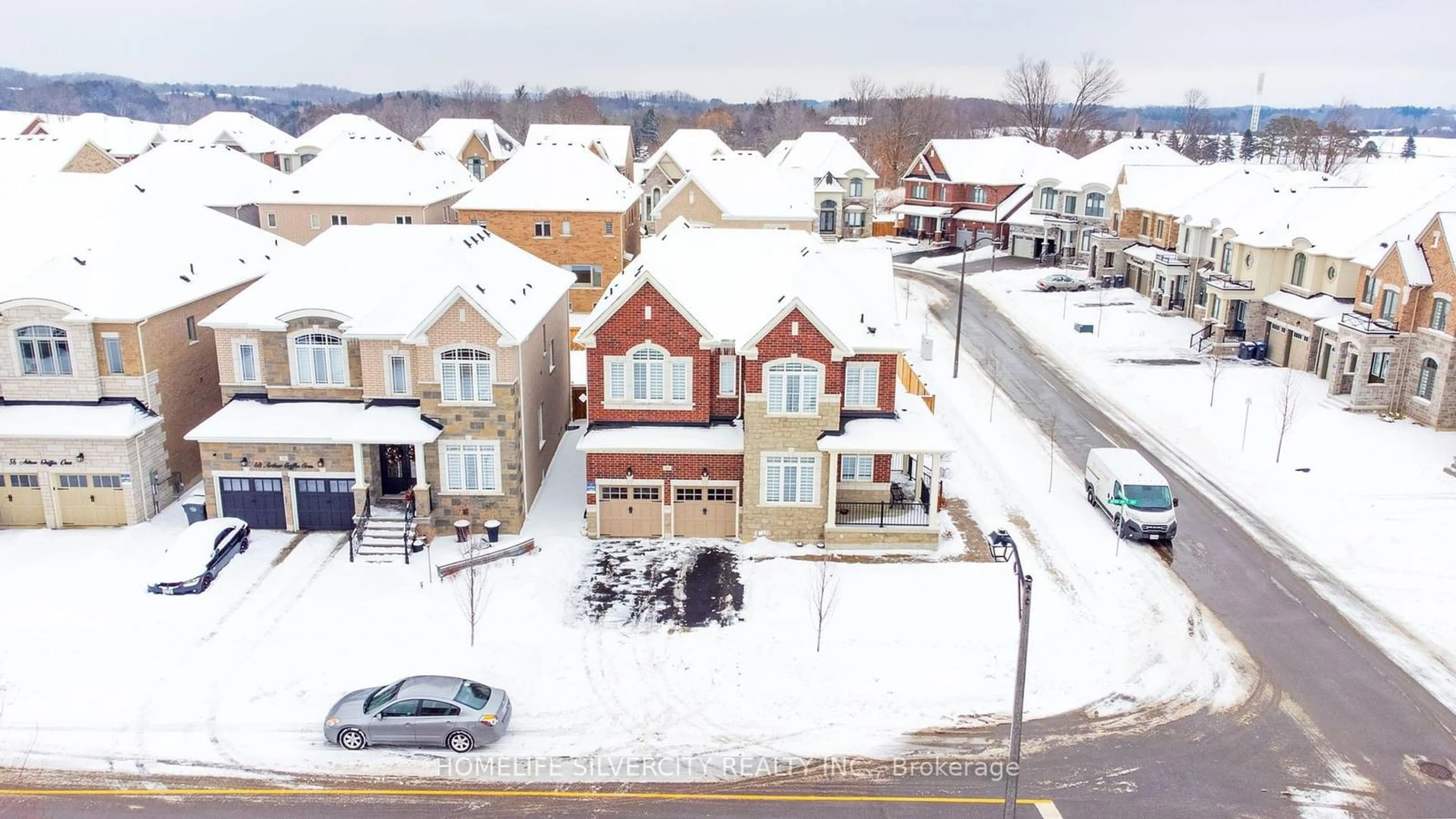 A pic from outside/outdoor area/front of a property/back of a property/a pic from drone, street for 60 Arthur Griffin Cres, Caledon Ontario L7C 4E9