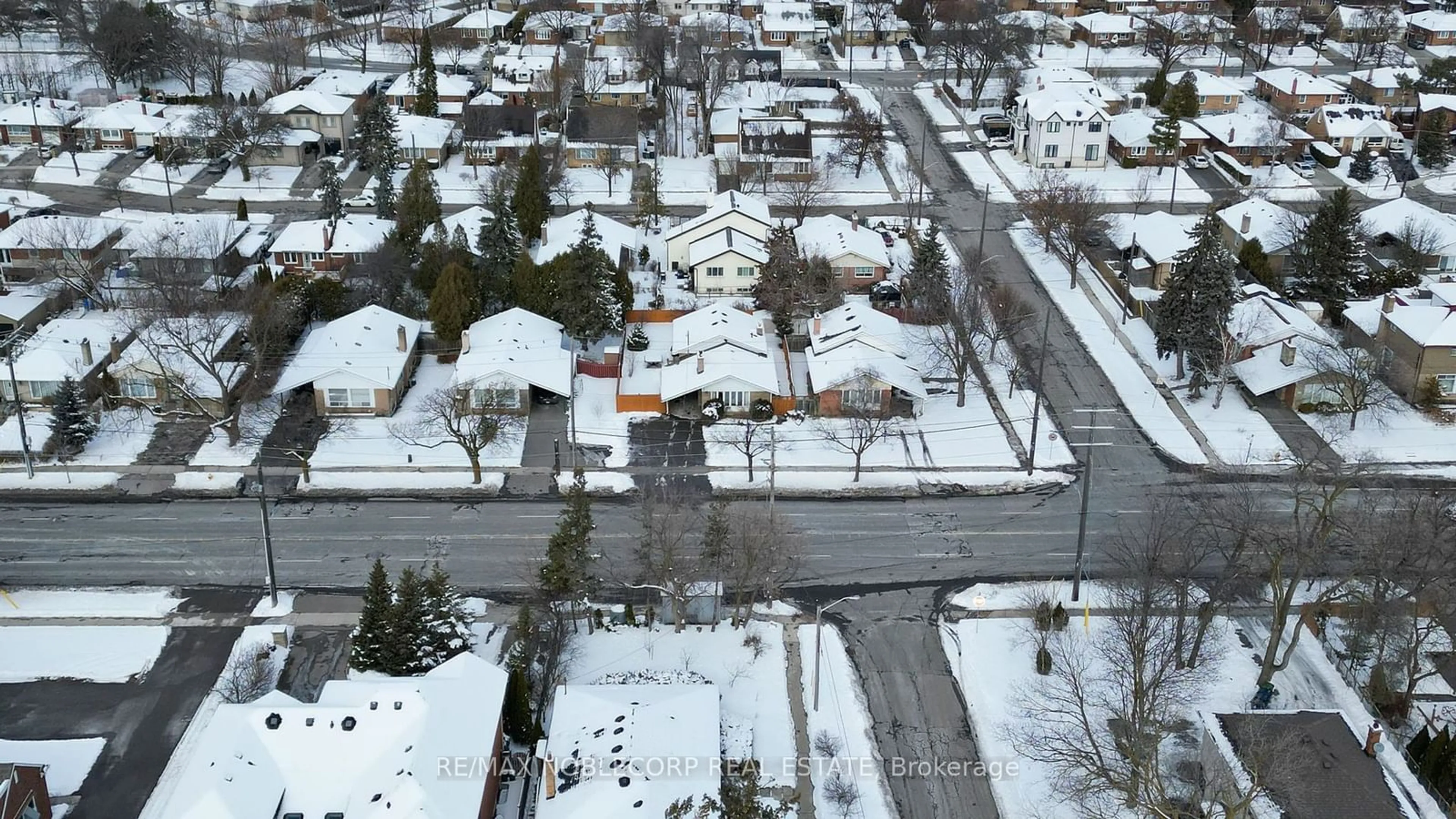 A pic from outside/outdoor area/front of a property/back of a property/a pic from drone, street for 4230 Bloor St, Toronto Ontario M9C 1Z7