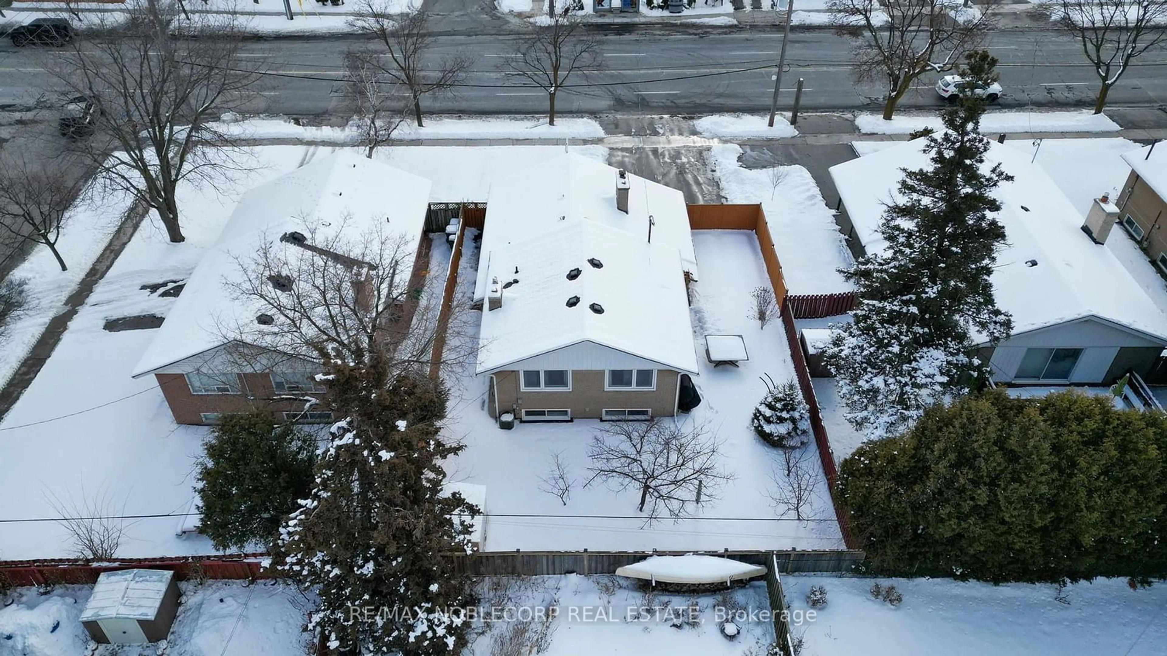 A pic from outside/outdoor area/front of a property/back of a property/a pic from drone, street for 4230 Bloor St, Toronto Ontario M9C 1Z7