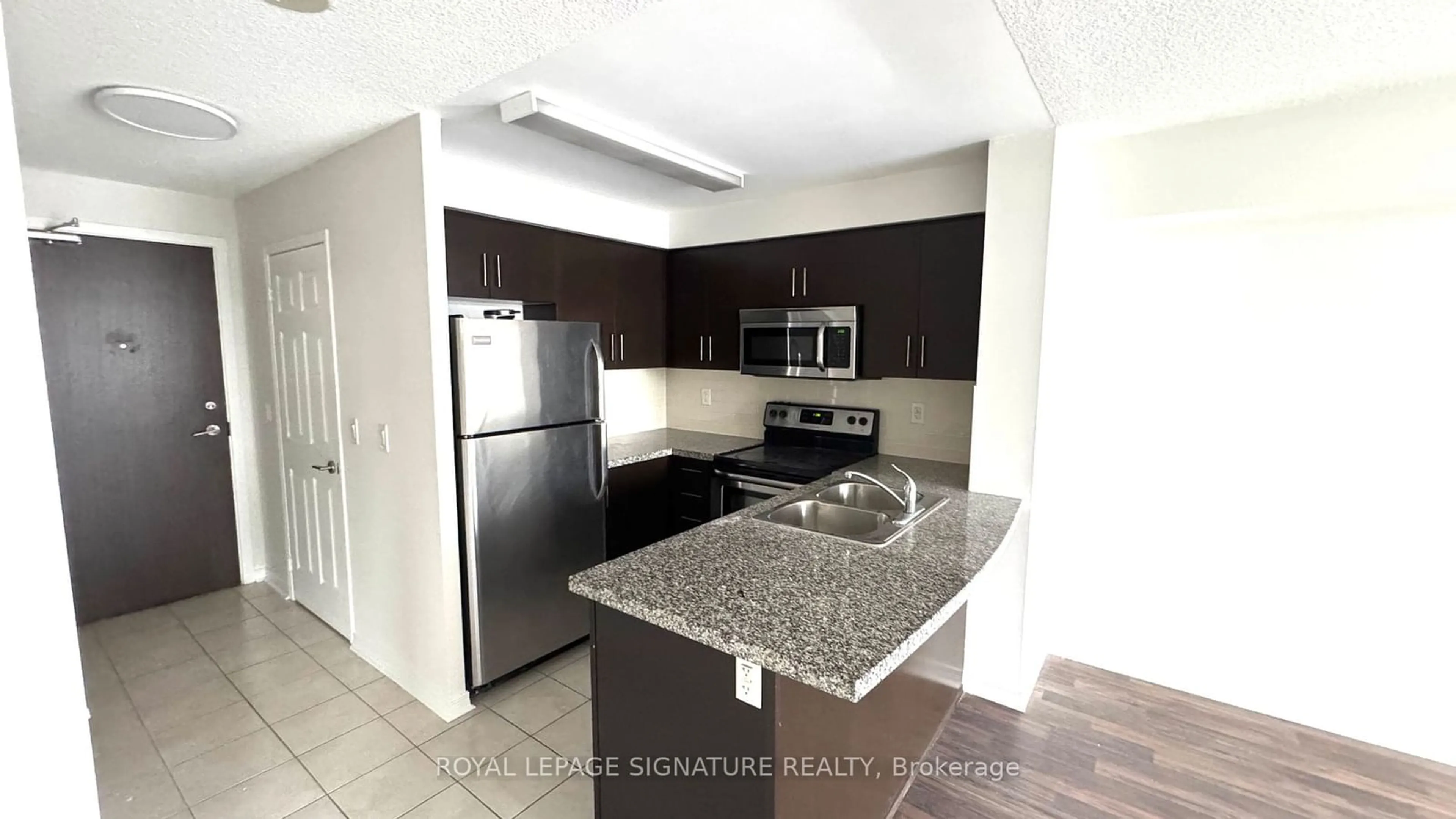 Standard kitchen, ceramic/tile floor for 3 Michael Power Pl #605, Toronto Ontario M9A 0A2