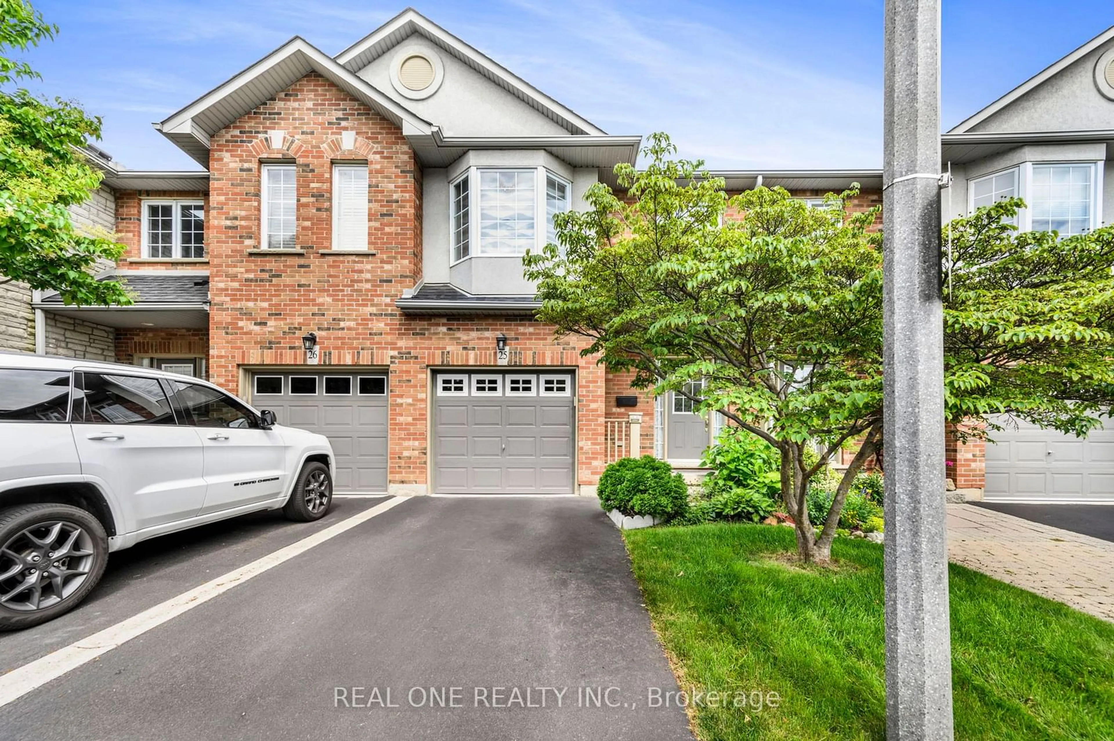 A pic from outside/outdoor area/front of a property/back of a property/a pic from drone, street for 963 KING Rd #25, Burlington Ontario L7T 3L2