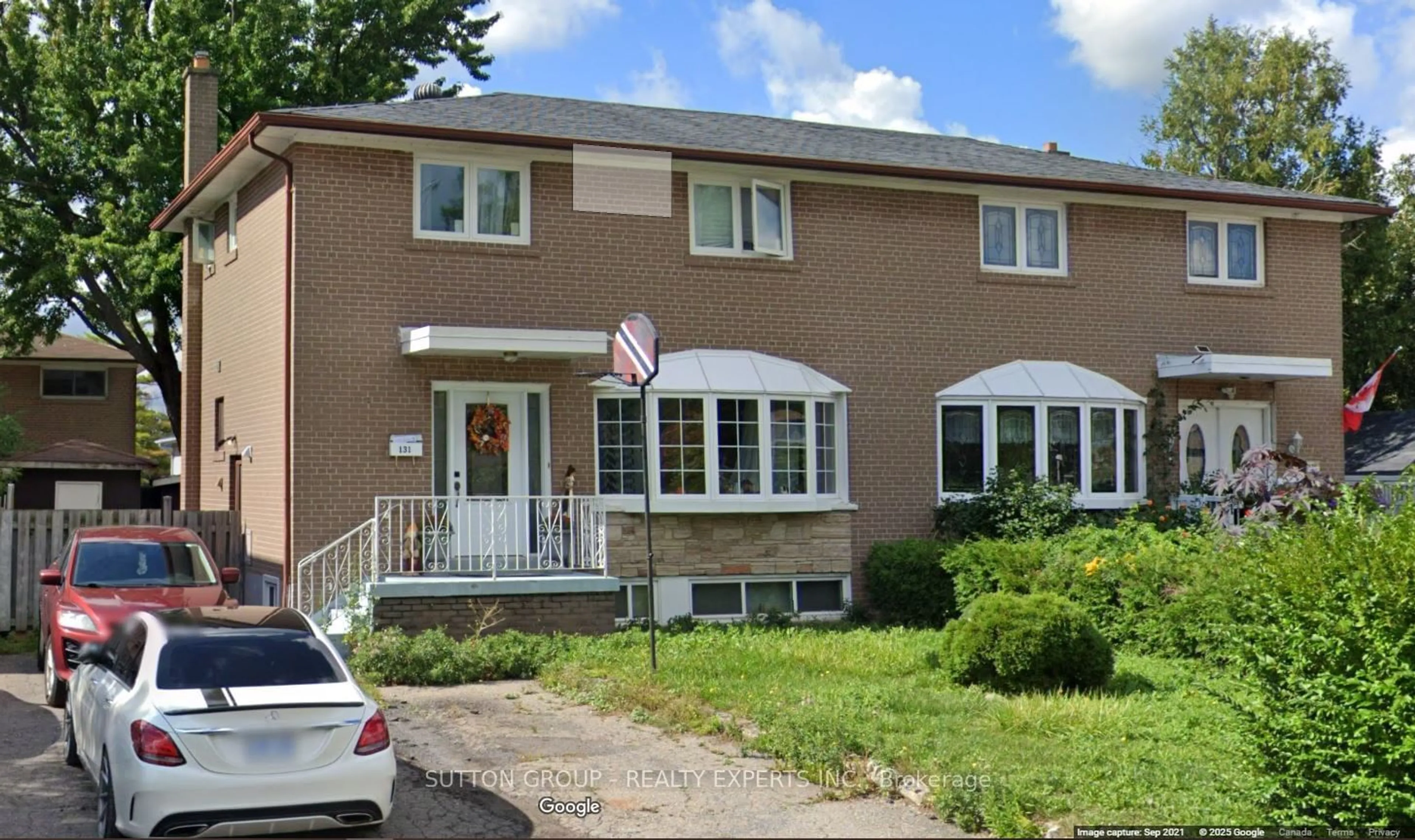 Home with brick exterior material, street for 131 Mcmurchy Ave, Brampton Ontario L6Y 1Z1