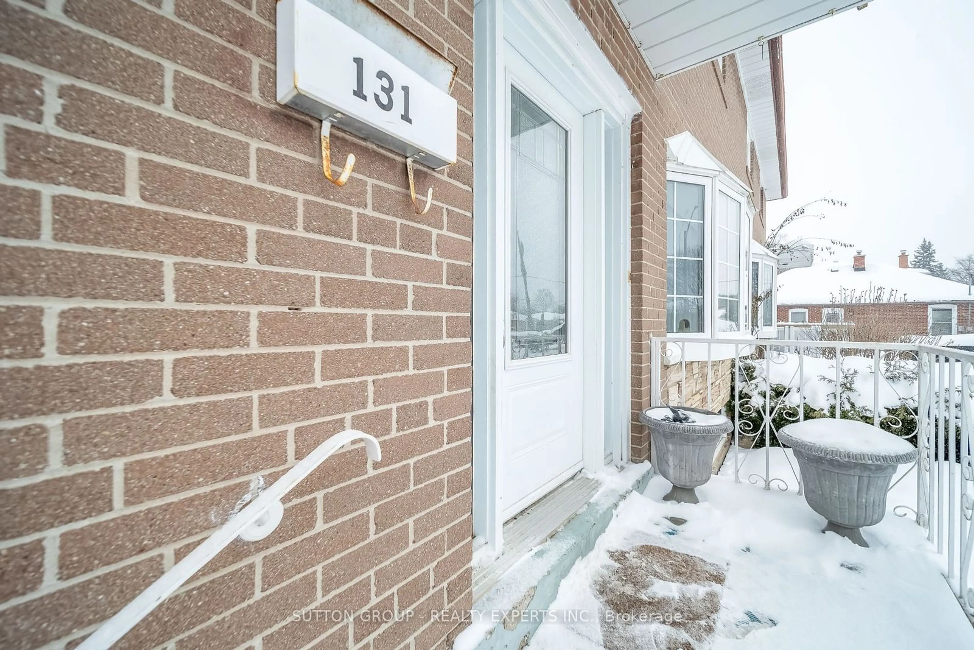 Home with brick exterior material, street for 131 Mcmurchy Ave, Brampton Ontario L6Y 1Z1