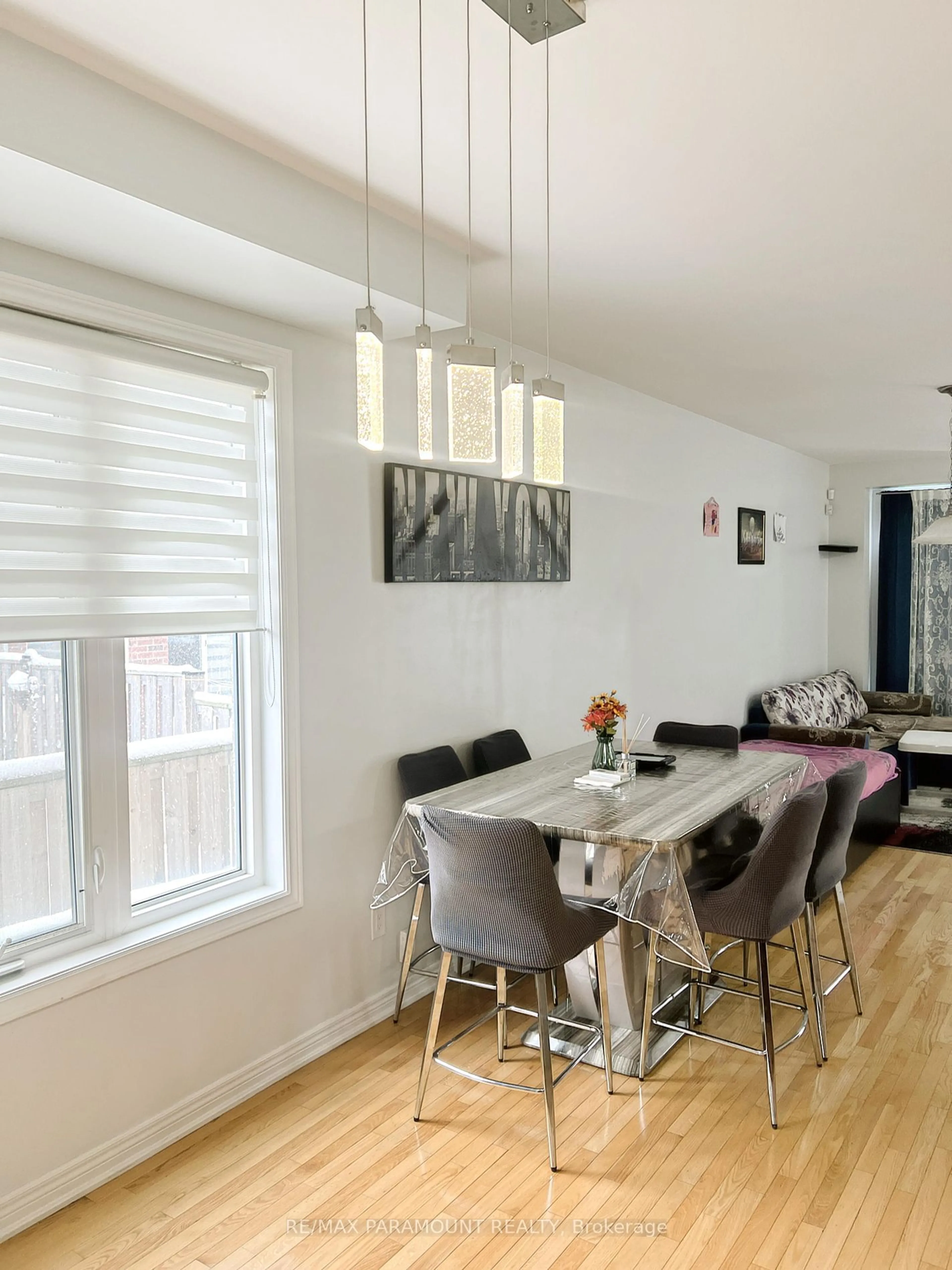 Dining room, wood/laminate floor for 49 Pendulum Circ, Brampton Ontario L6R 3N5