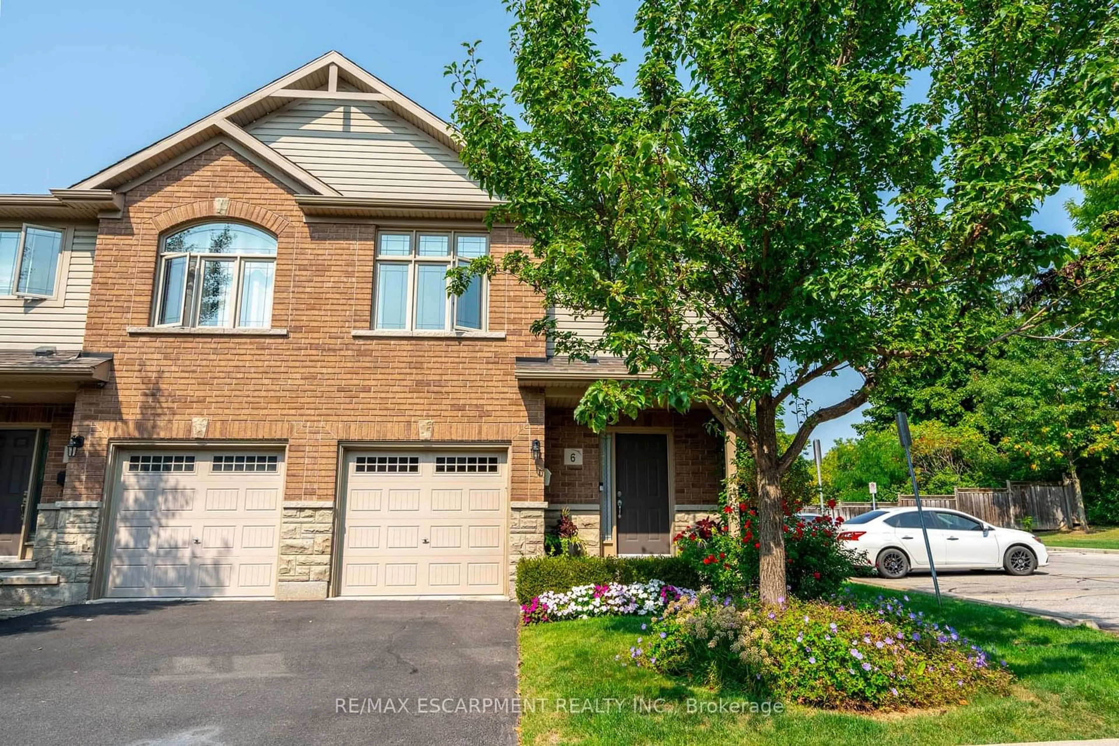 Home with brick exterior material, street for 1491 Plains Rd #6, Burlington Ontario L7T 4H1