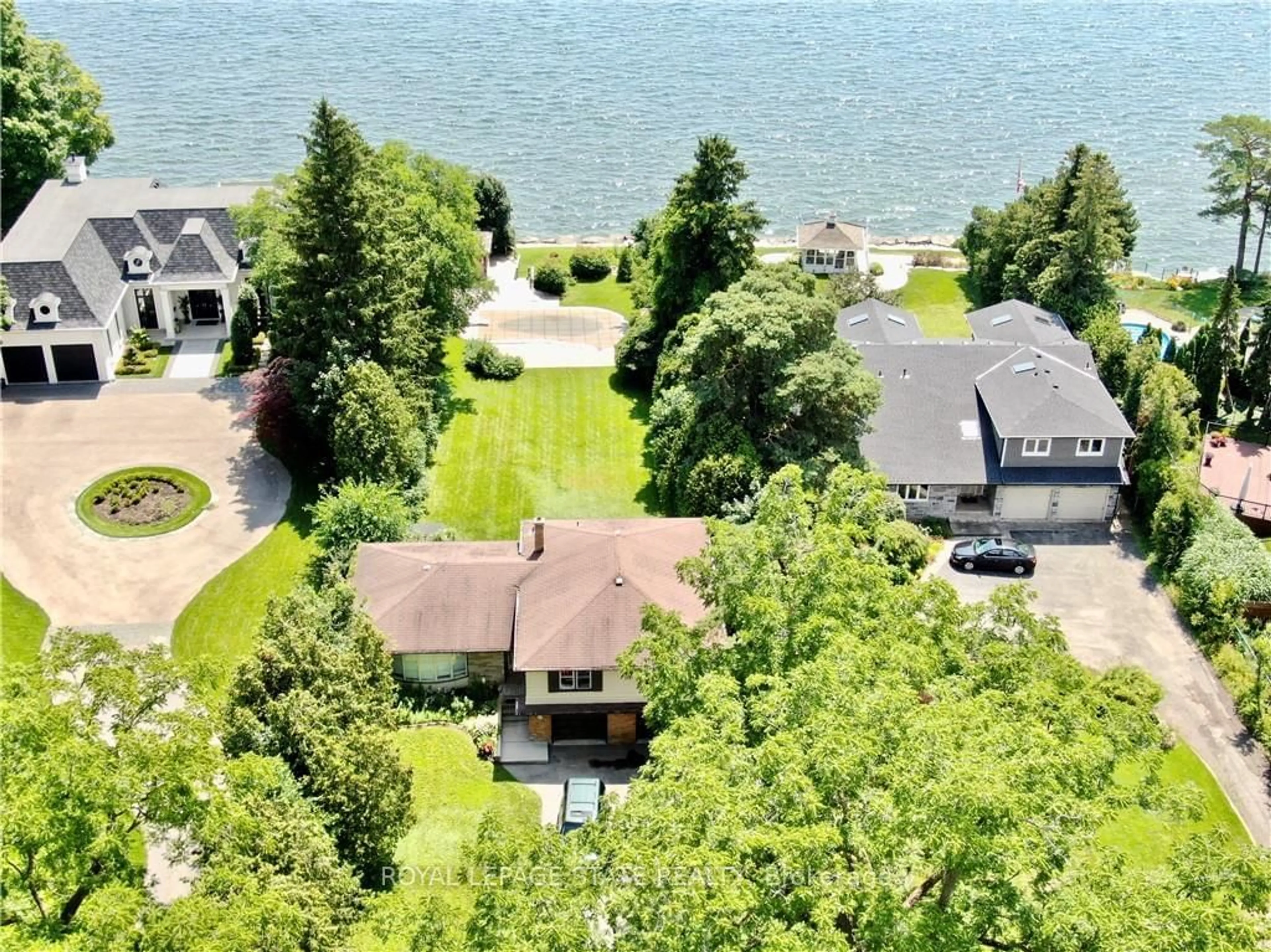 A pic from outside/outdoor area/front of a property/back of a property/a pic from drone, water/lake/river/ocean view for 2278 Lakeshore Rd, Burlington Ontario L7R 1A9