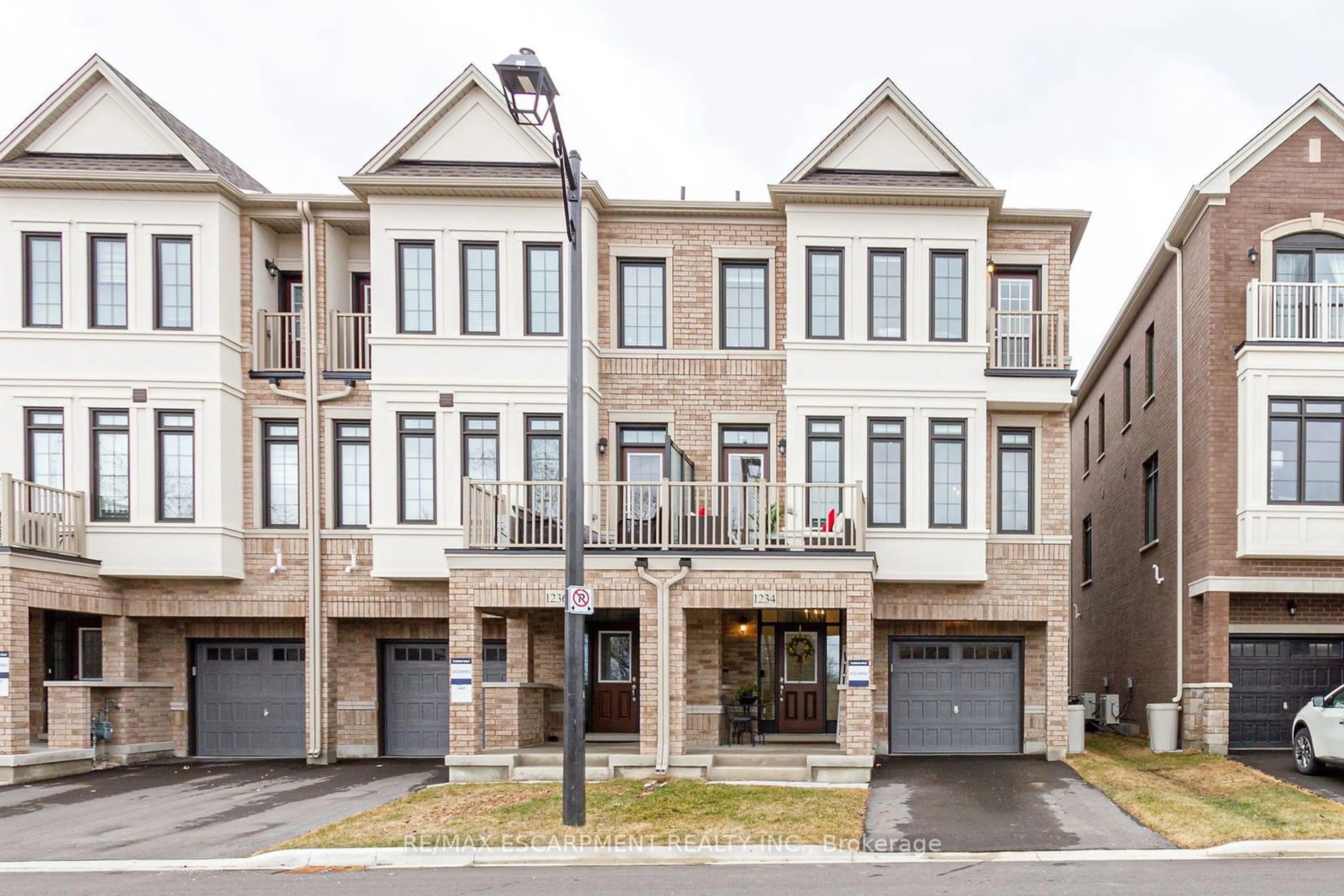 Home with brick exterior material, street for 1234 Restivo Lane, Milton Ontario L9E 1J9