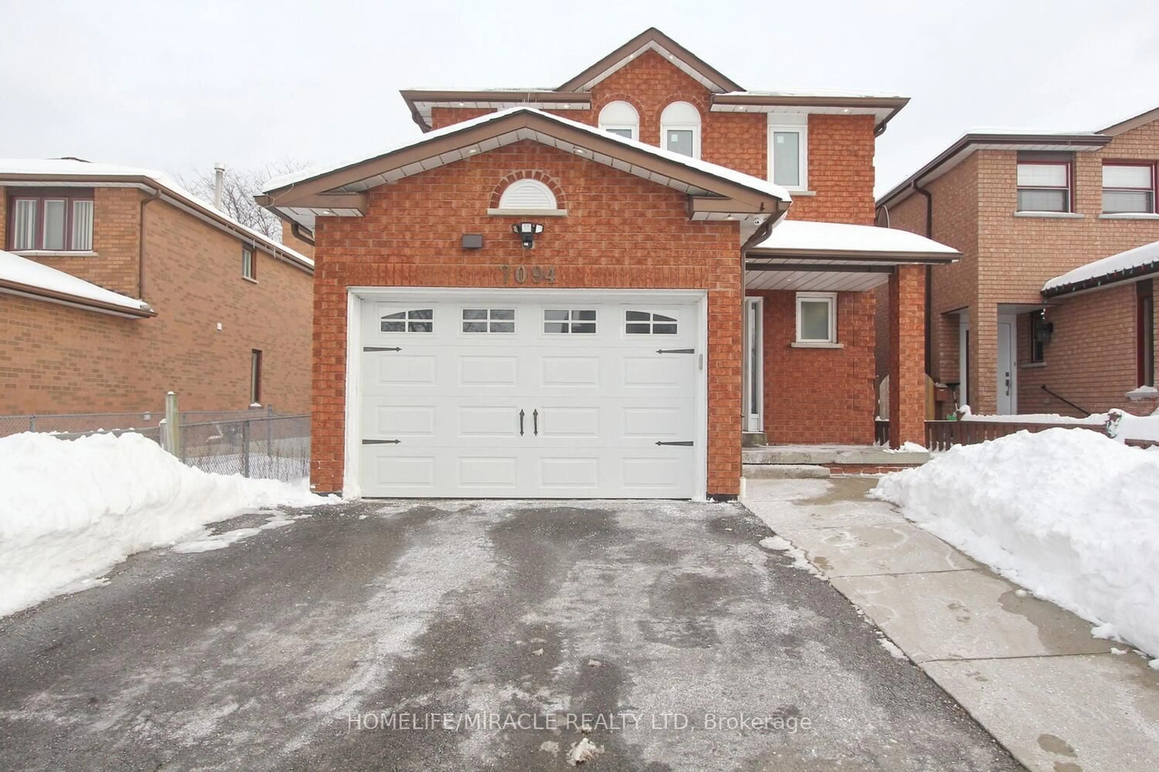 Home with brick exterior material, street for 7094 Dalewood Dr, Mississauga Ontario L4T 4G7