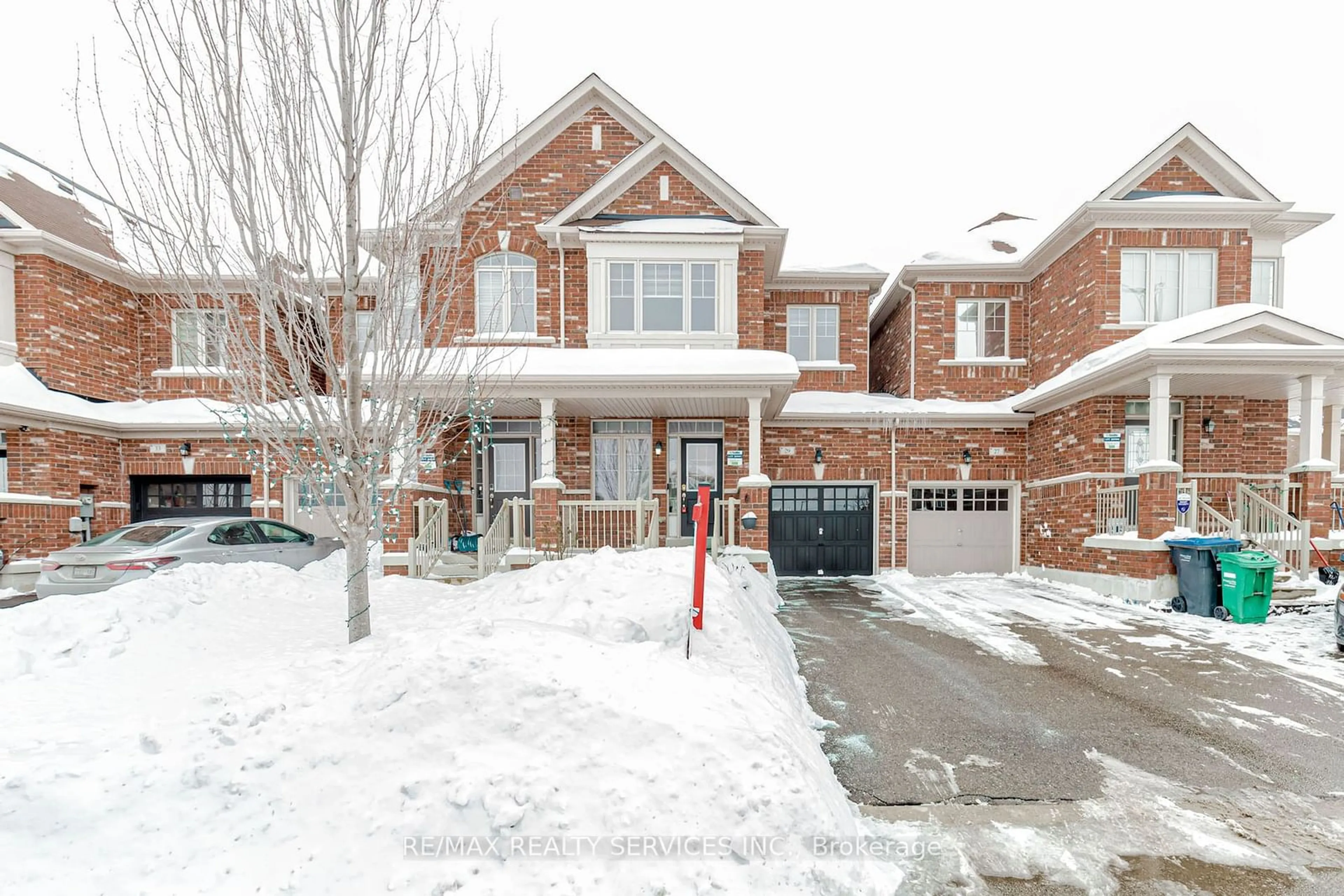 Home with brick exterior material, street for 29 Kempenfelt Tr, Brampton Ontario L7A 0Z6