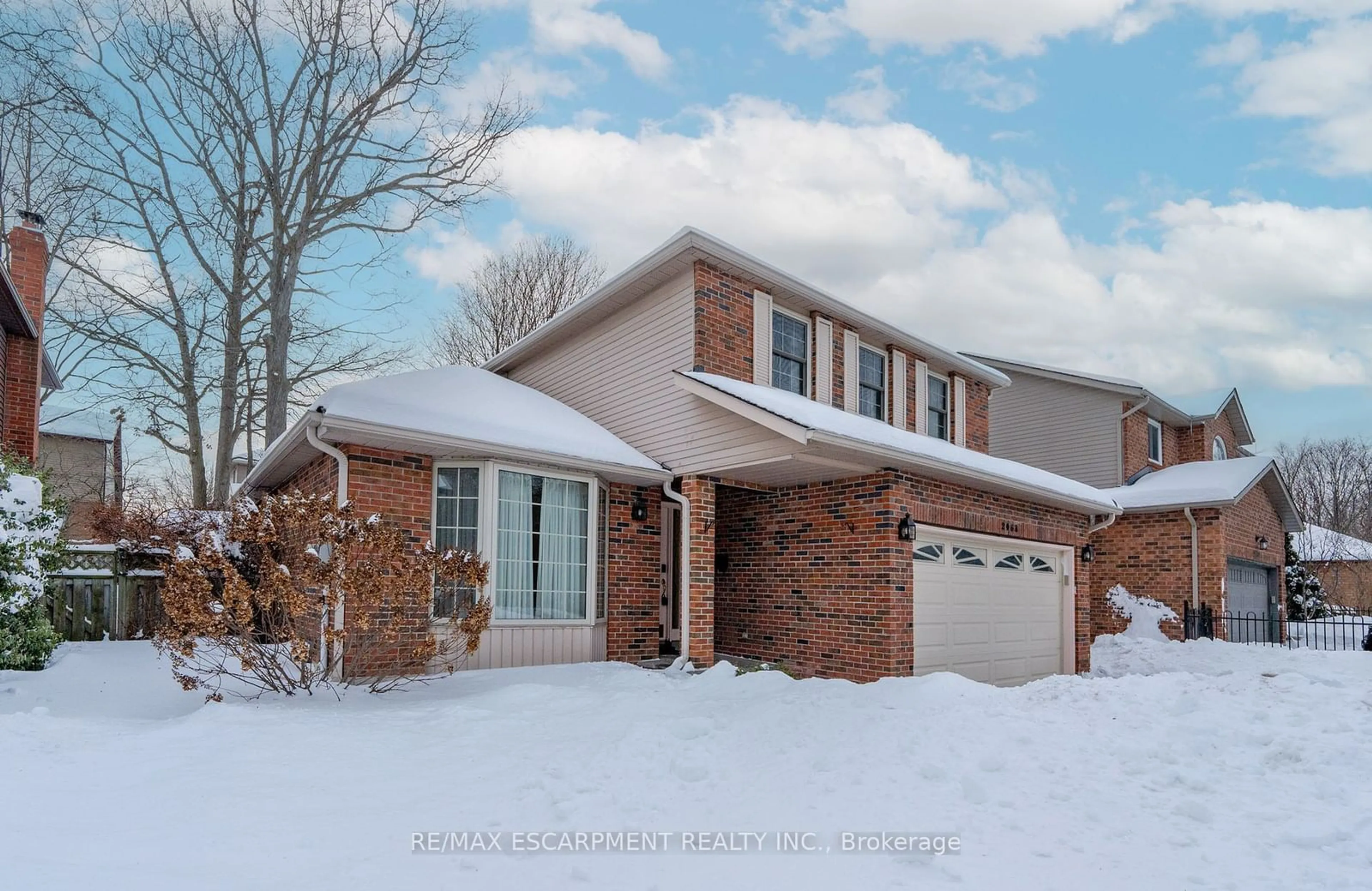 Home with brick exterior material, street for 2068 Headon Rd, Burlington Ontario L7M 4G3