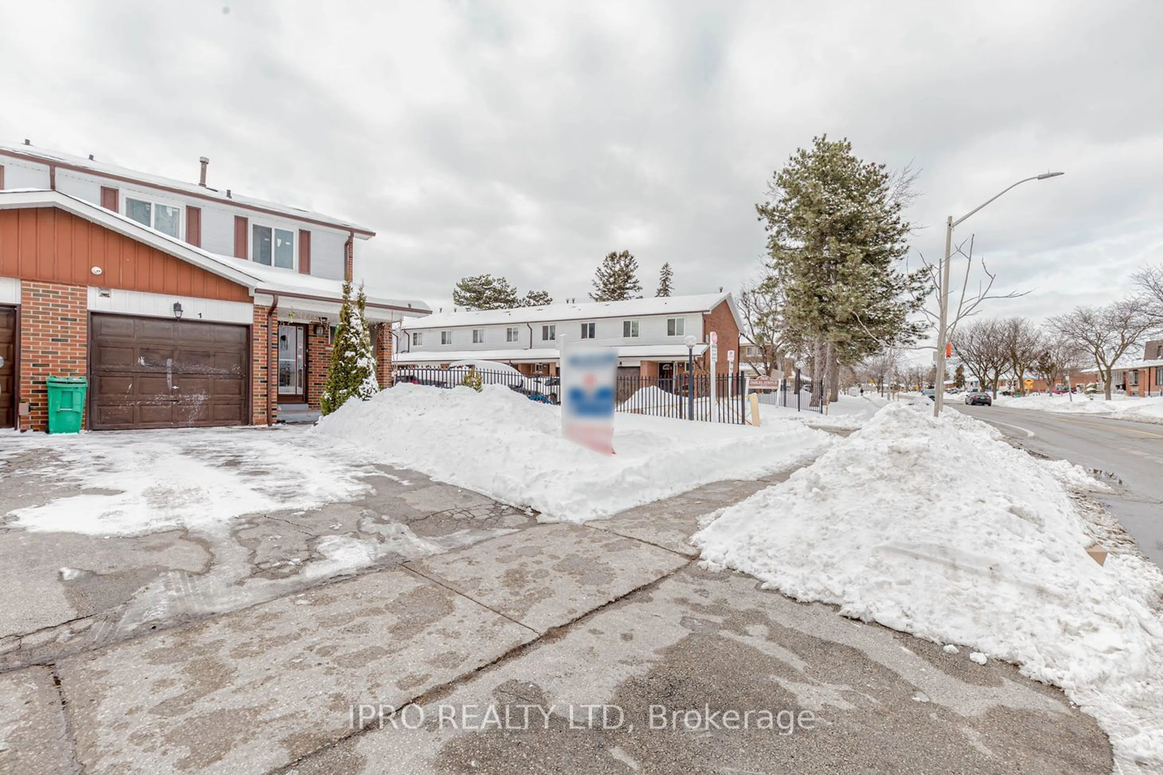 A pic from outside/outdoor area/front of a property/back of a property/a pic from drone, street for 7406 Darcel Ave #1, Mississauga Ontario L4T 2X7