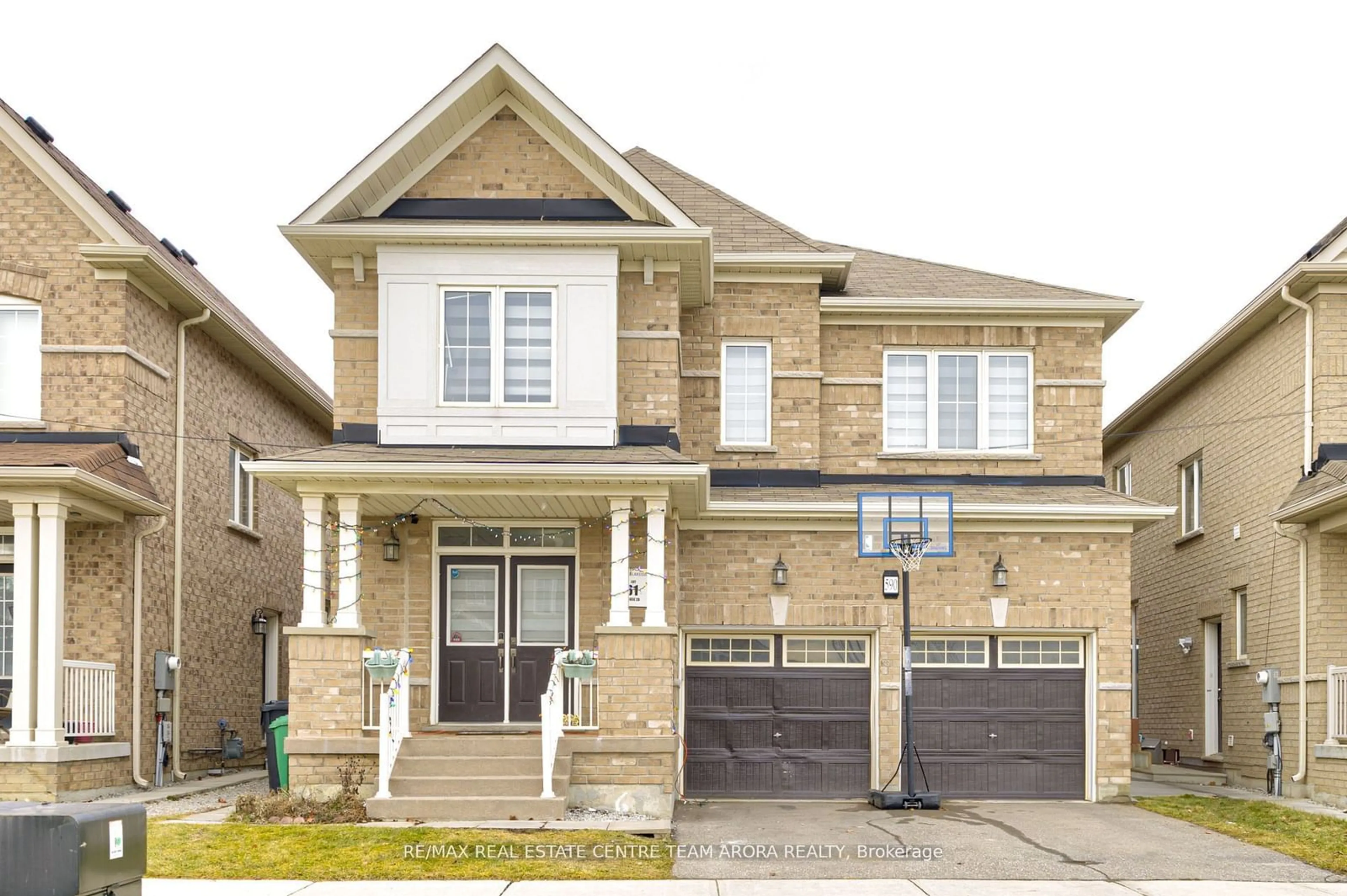 Home with brick exterior material, street for 590 Remembrance Rd, Brampton Ontario L7A 4N2