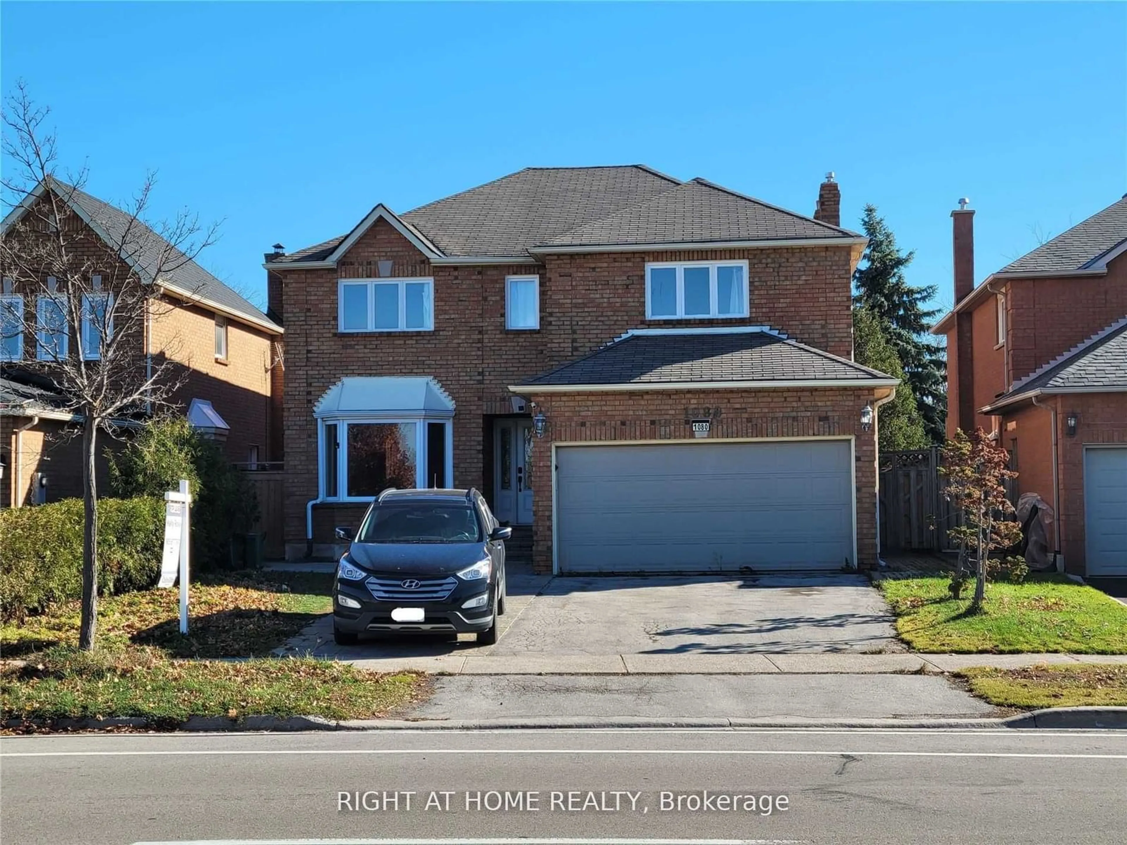 Home with brick exterior material, street for 1080 Glenashton Dr, Oakville Ontario L6H 4B9