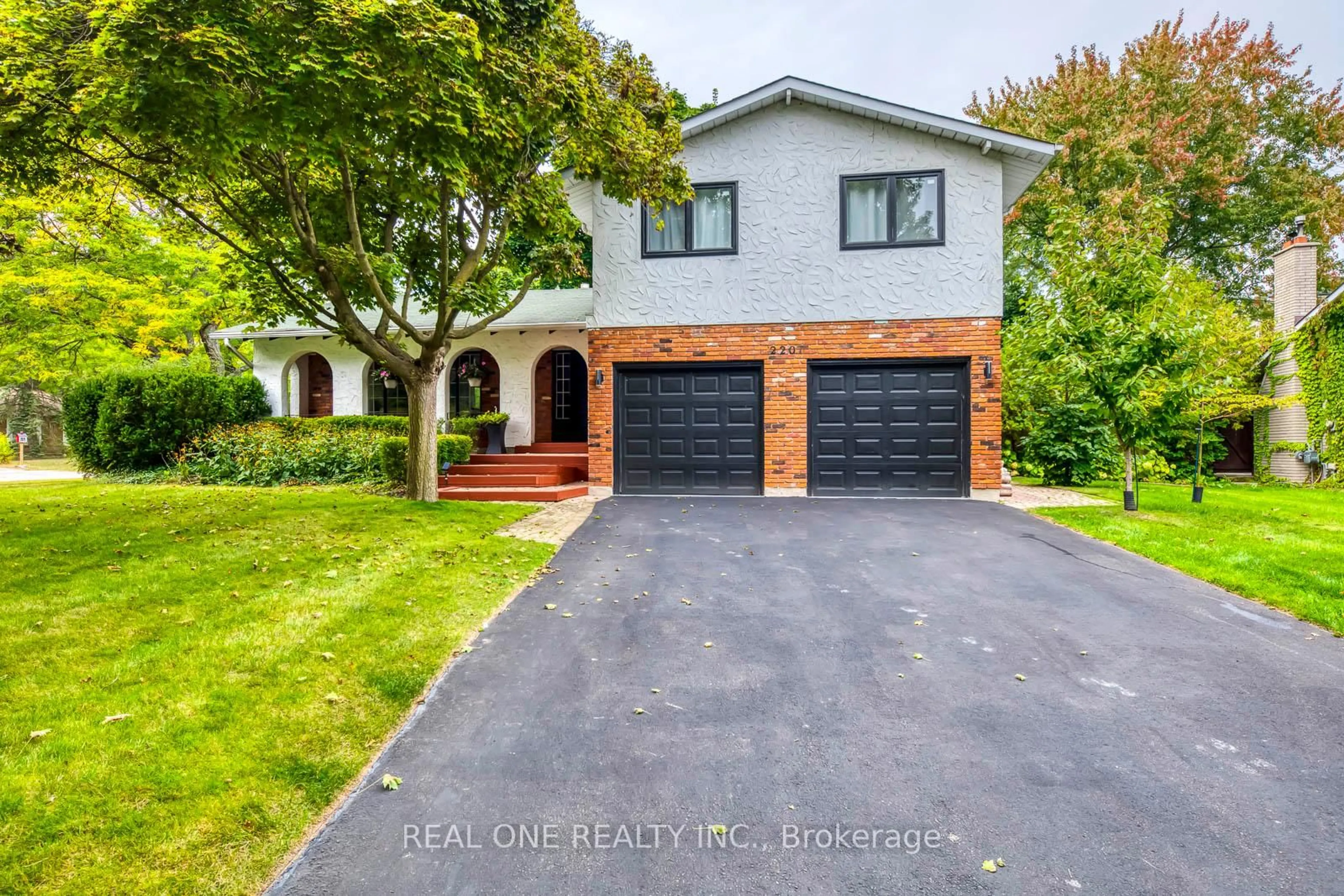 Home with brick exterior material, street for 2201 All Saints Cres, Oakville Ontario L6J 5N1