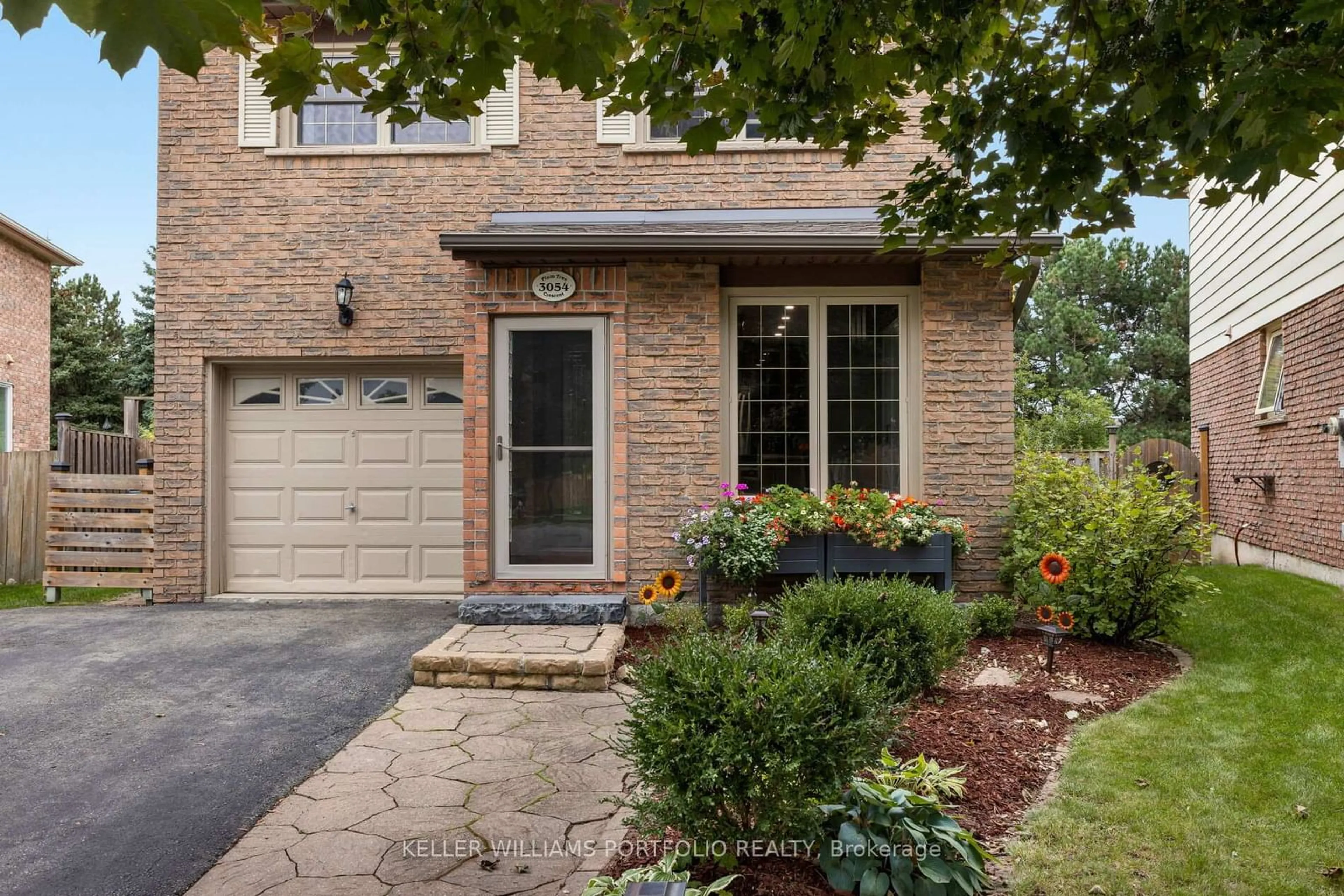 Home with brick exterior material, street for 3054 Plum Tree Cres, Mississauga Ontario L5N 4W6