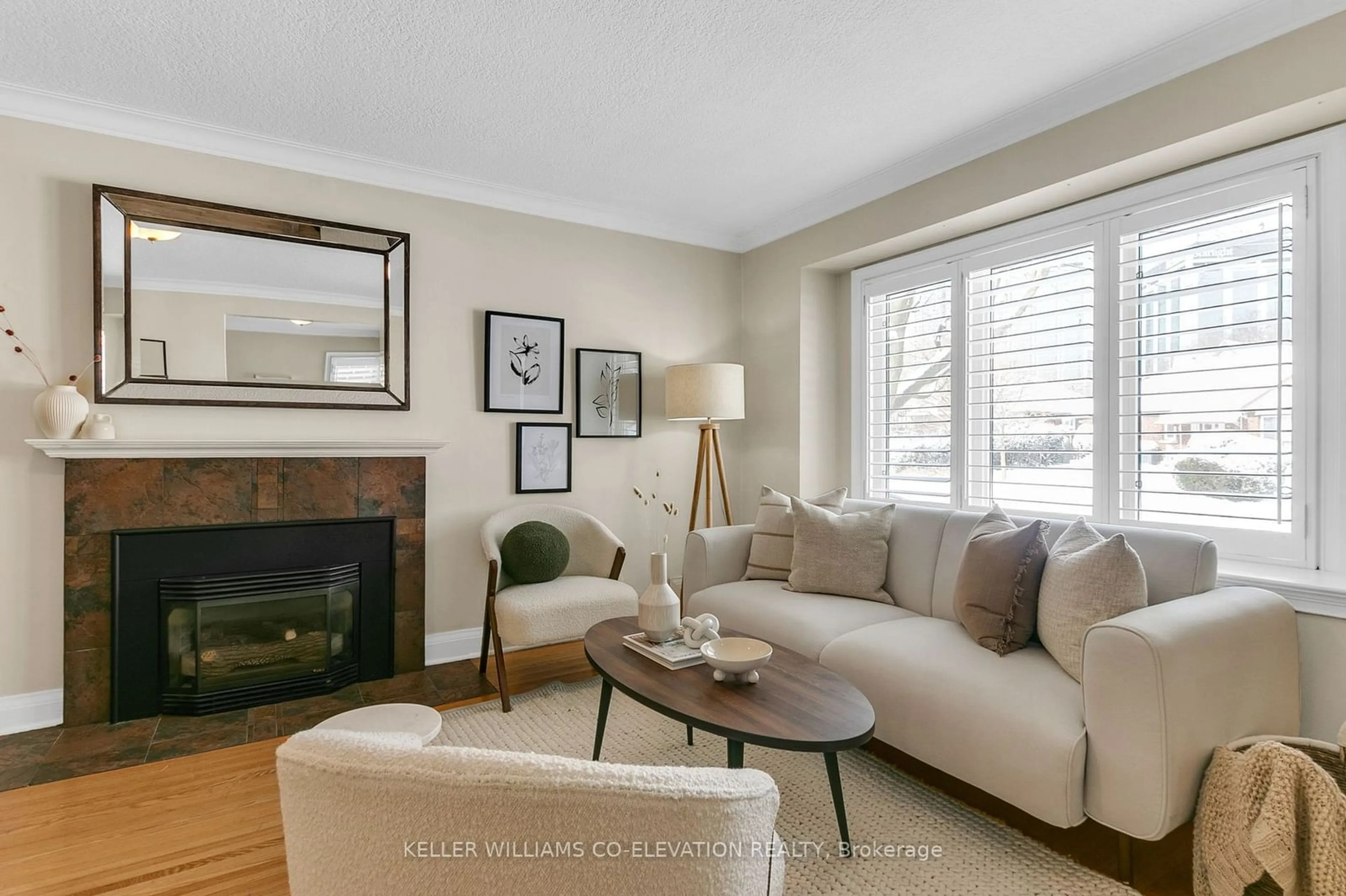 Living room with furniture, wood/laminate floor for 131 Meadowvale Dr, Toronto Ontario M8Z 3K2