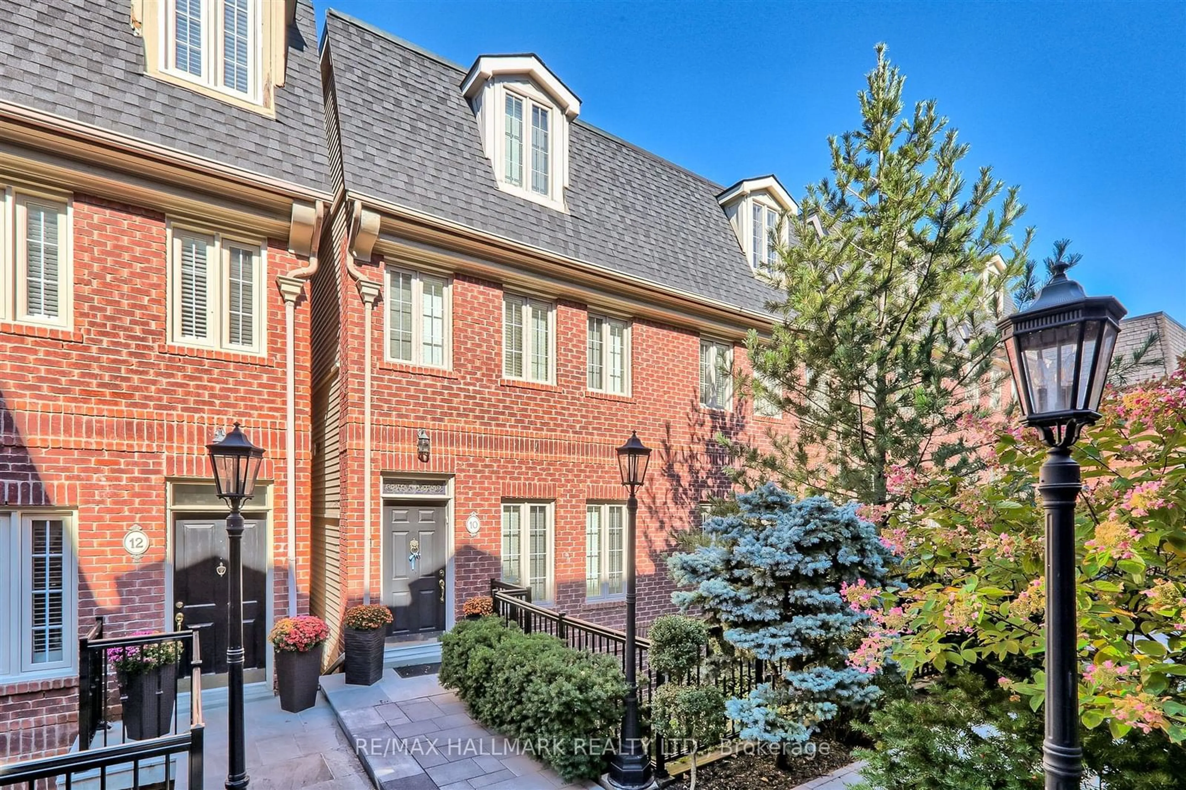 Home with brick exterior material, street for 10 Archgate Lane, Toronto Ontario M6E 5B1