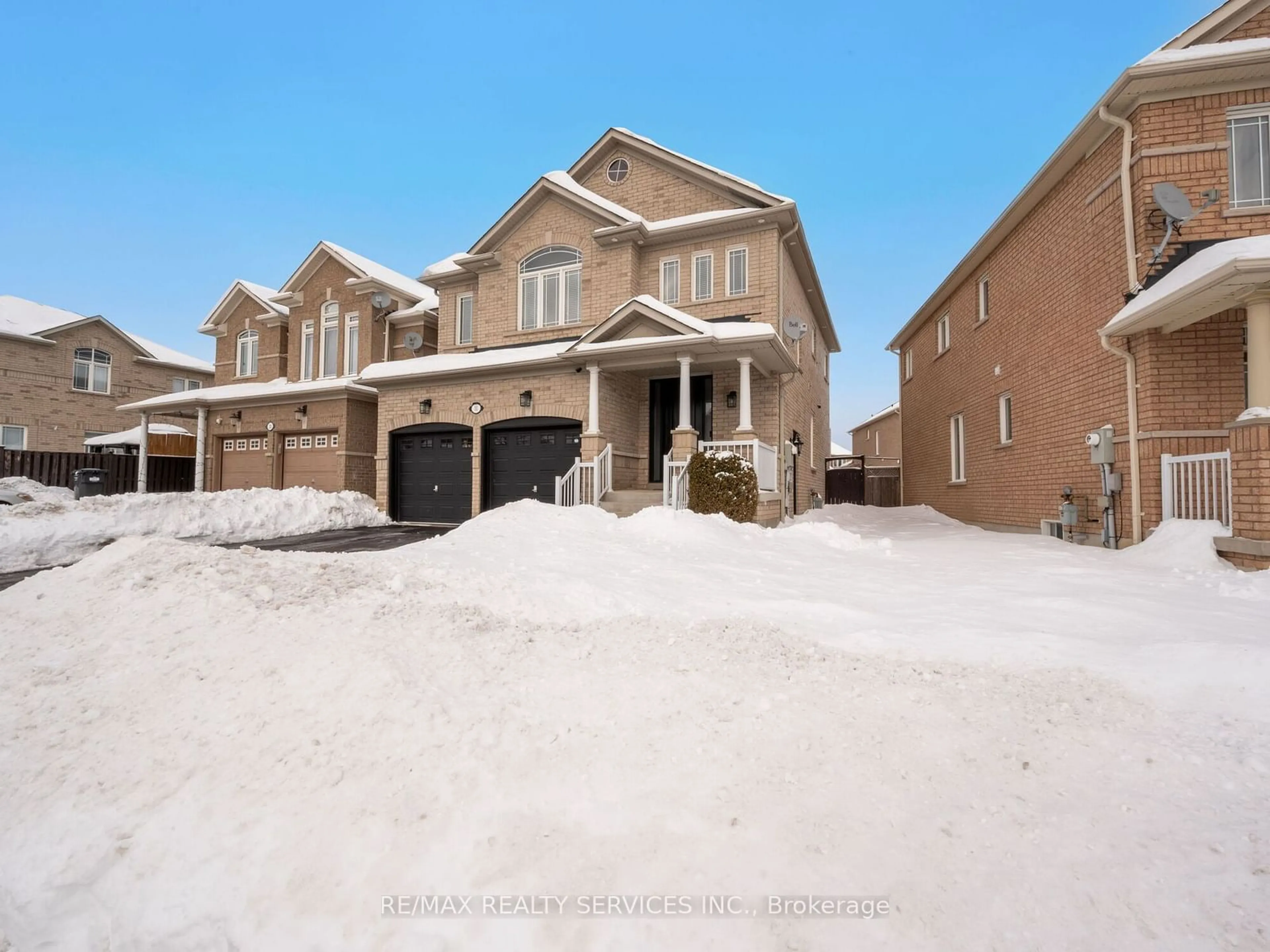 Home with brick exterior material, street for 11 Ansbury Dr, Brampton Ontario L7A 3S8