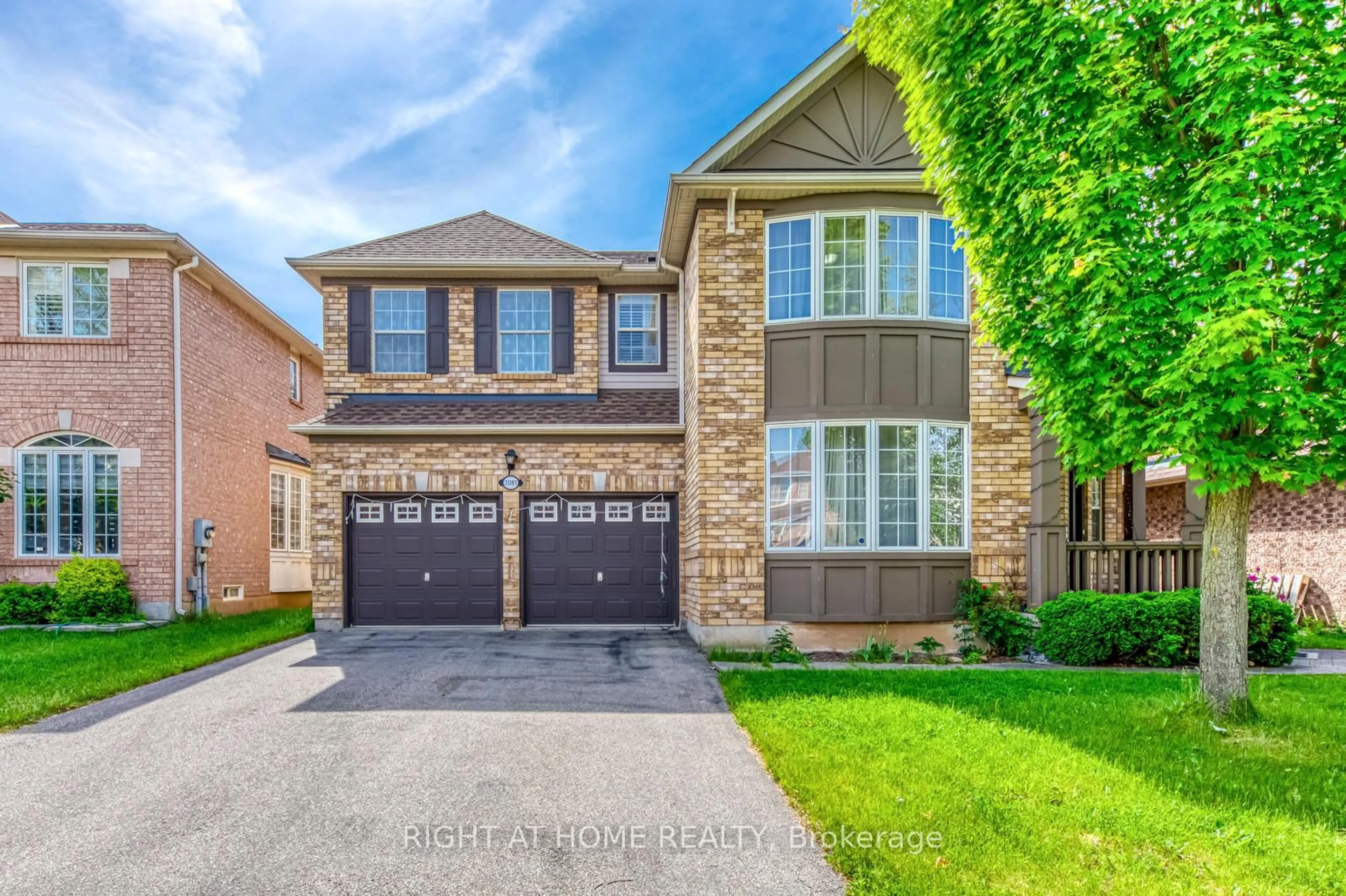 Home with brick exterior material, street for 2081 Ashmore Dr, Oakville Ontario L6M 4T2