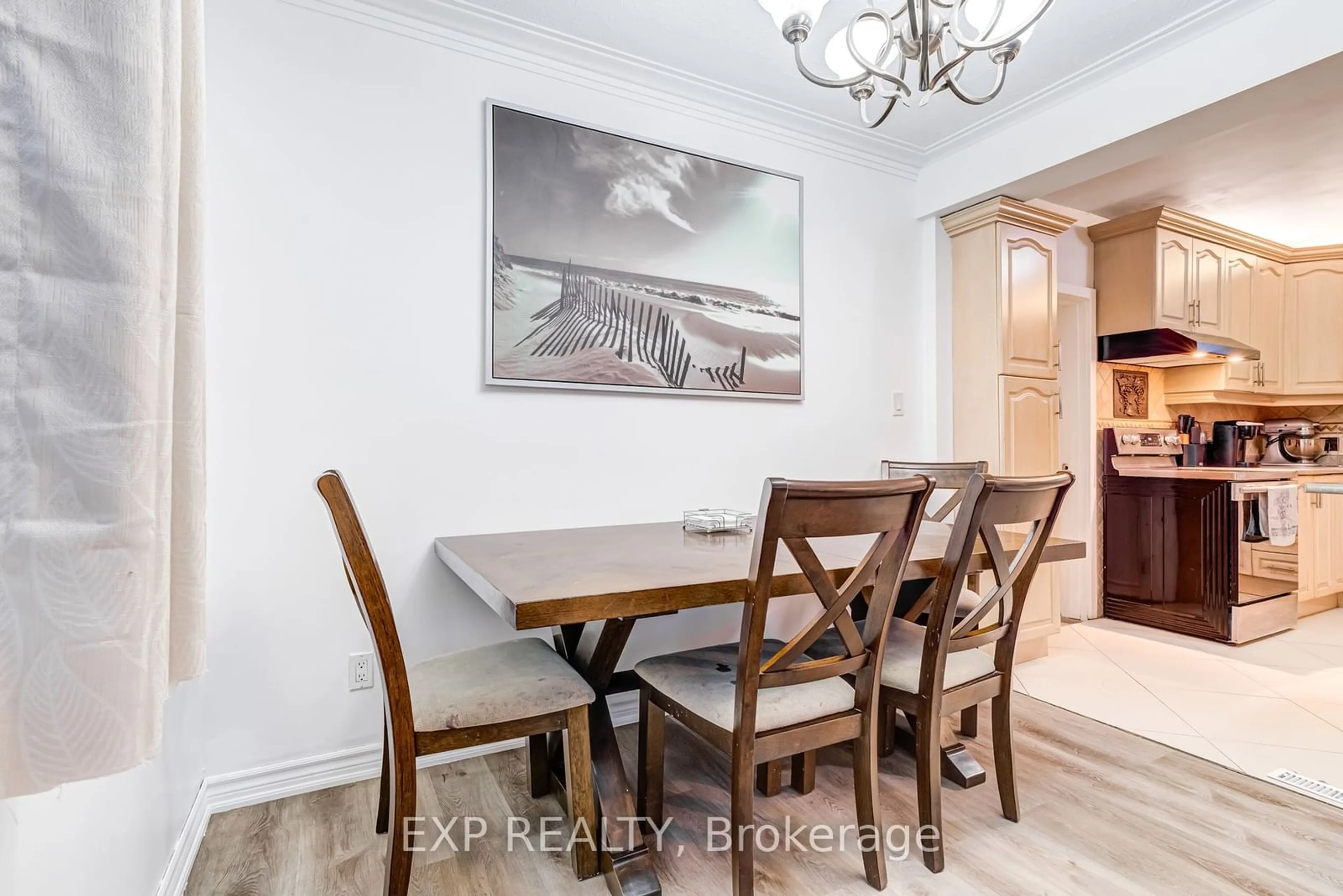 Dining room, wood/laminate floor for 3 Jodphur Ave, Toronto Ontario M9M 2J3