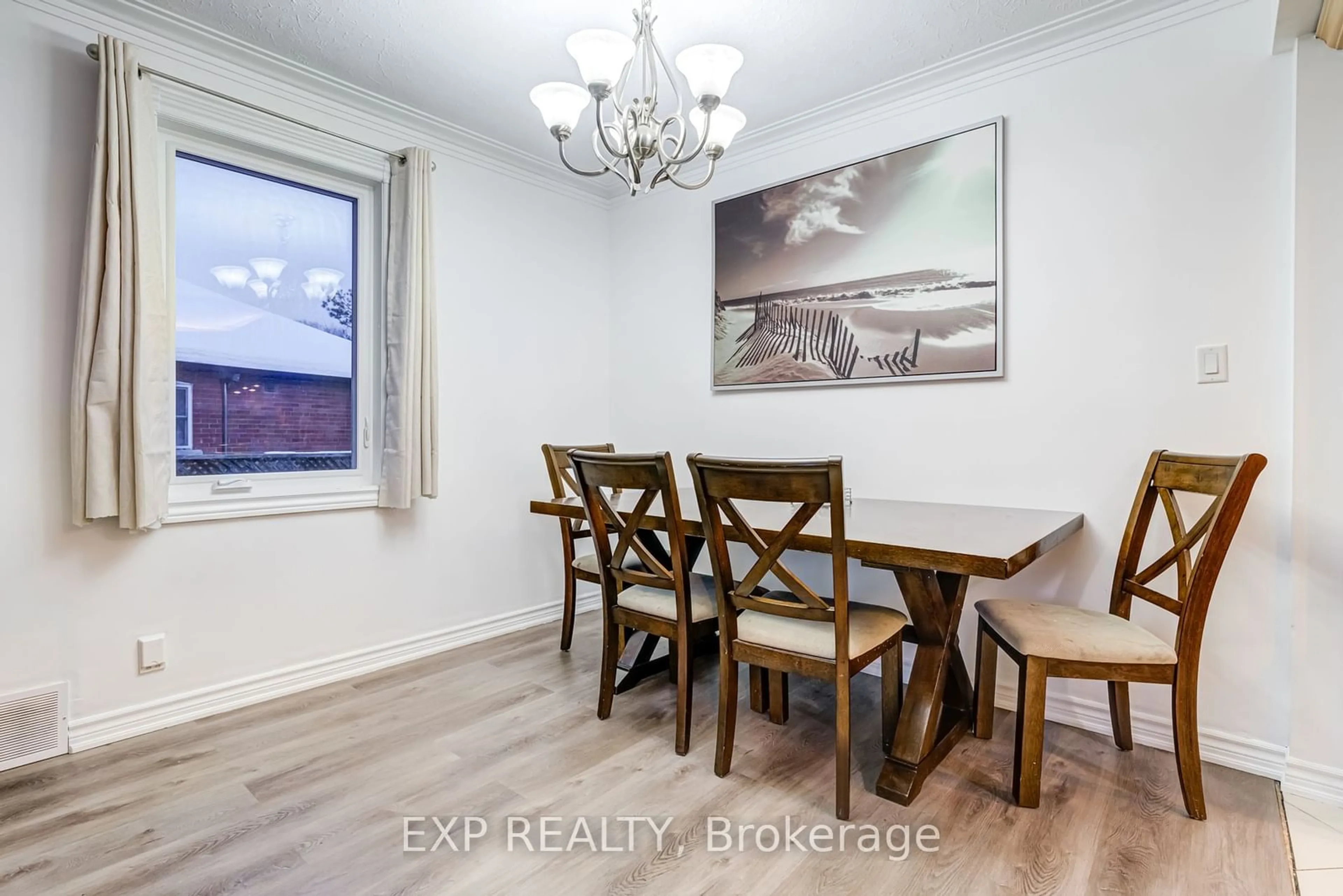 Dining room, wood/laminate floor for 3 Jodphur Ave, Toronto Ontario M9M 2J3