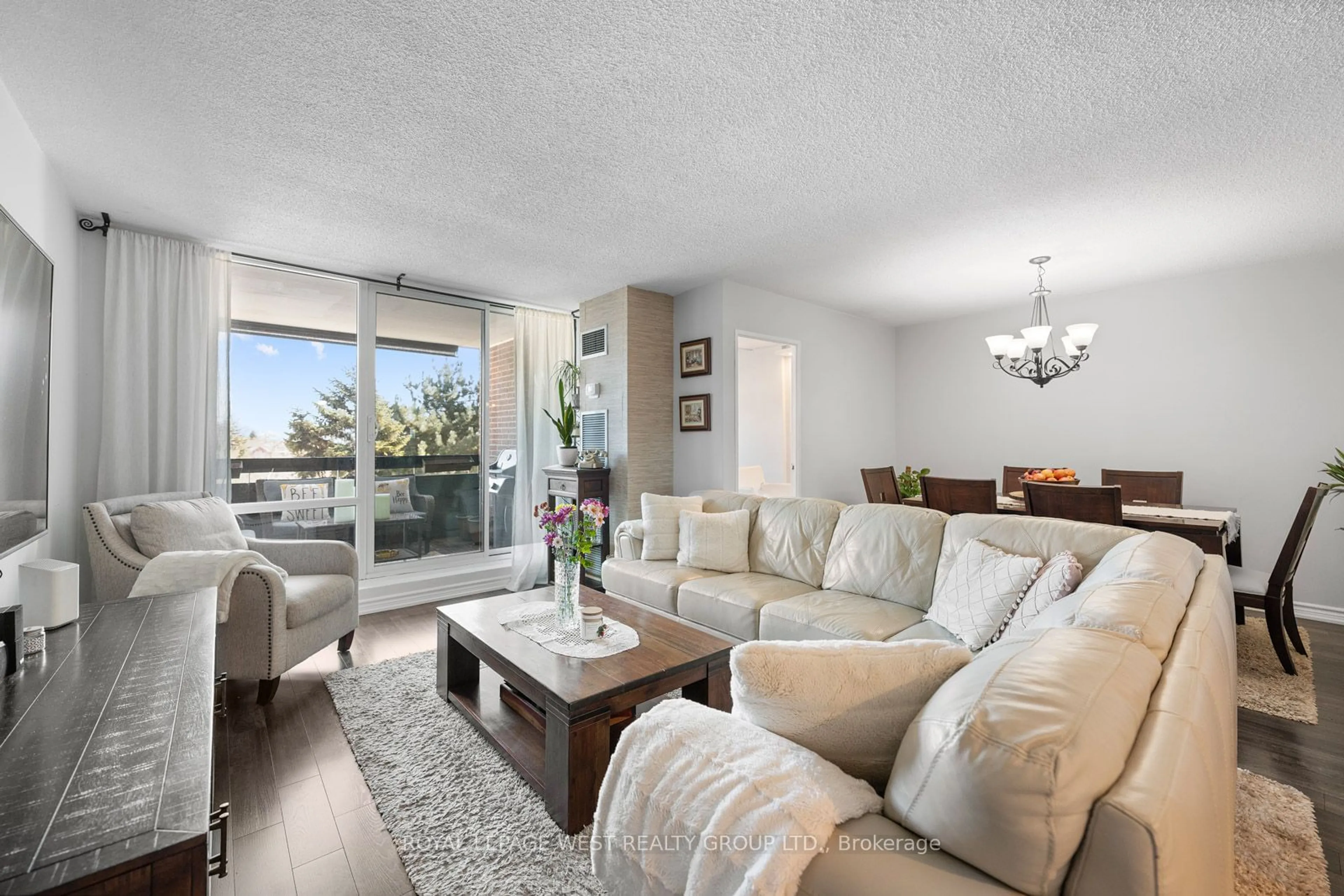 Living room with furniture, wood/laminate floor for 362 The East Mall #310, Toronto Ontario M9B 6C4