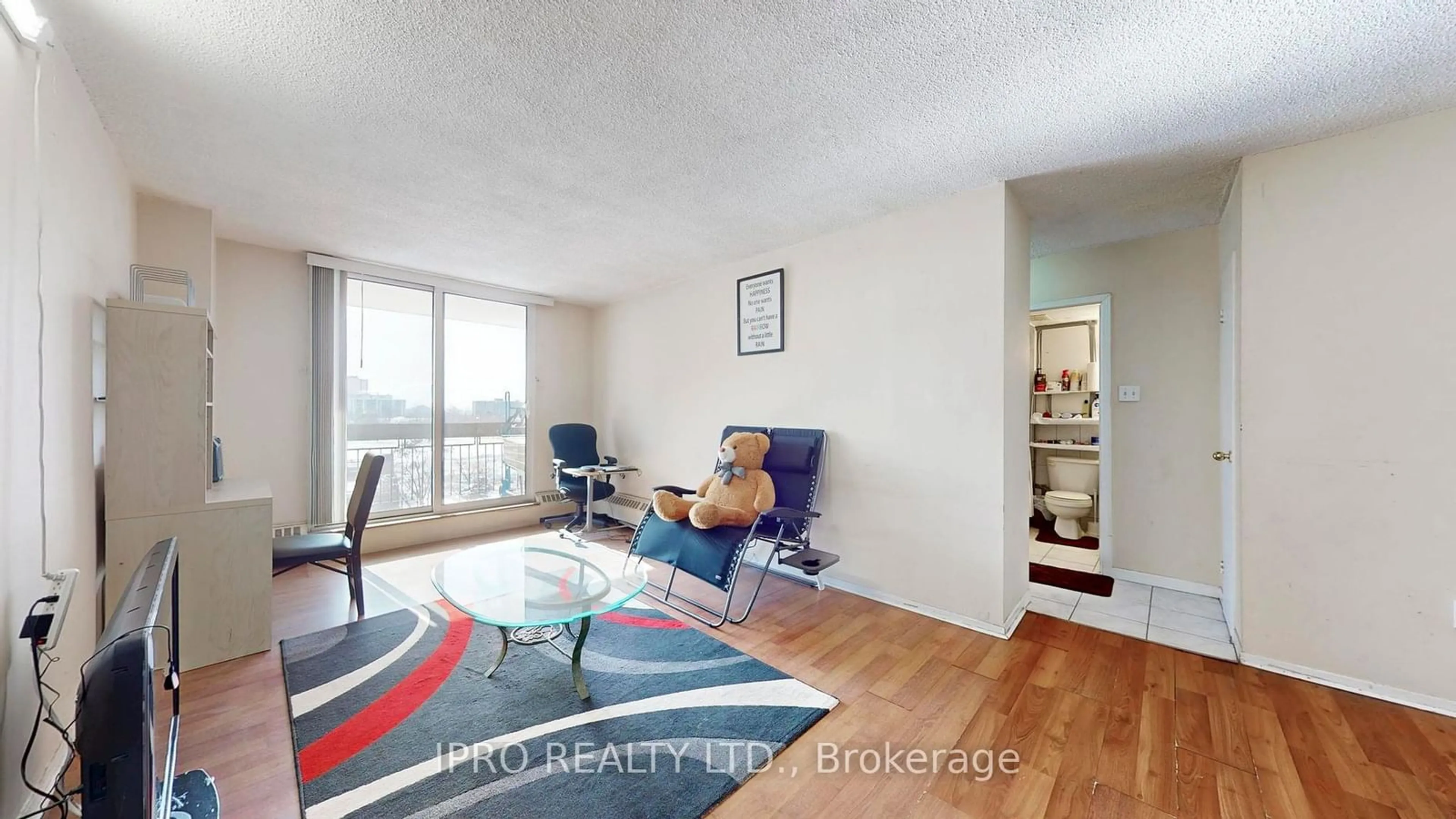 Living room with furniture, wood/laminate floor for 4645 Jane St #637, Toronto Ontario M3N 2K9