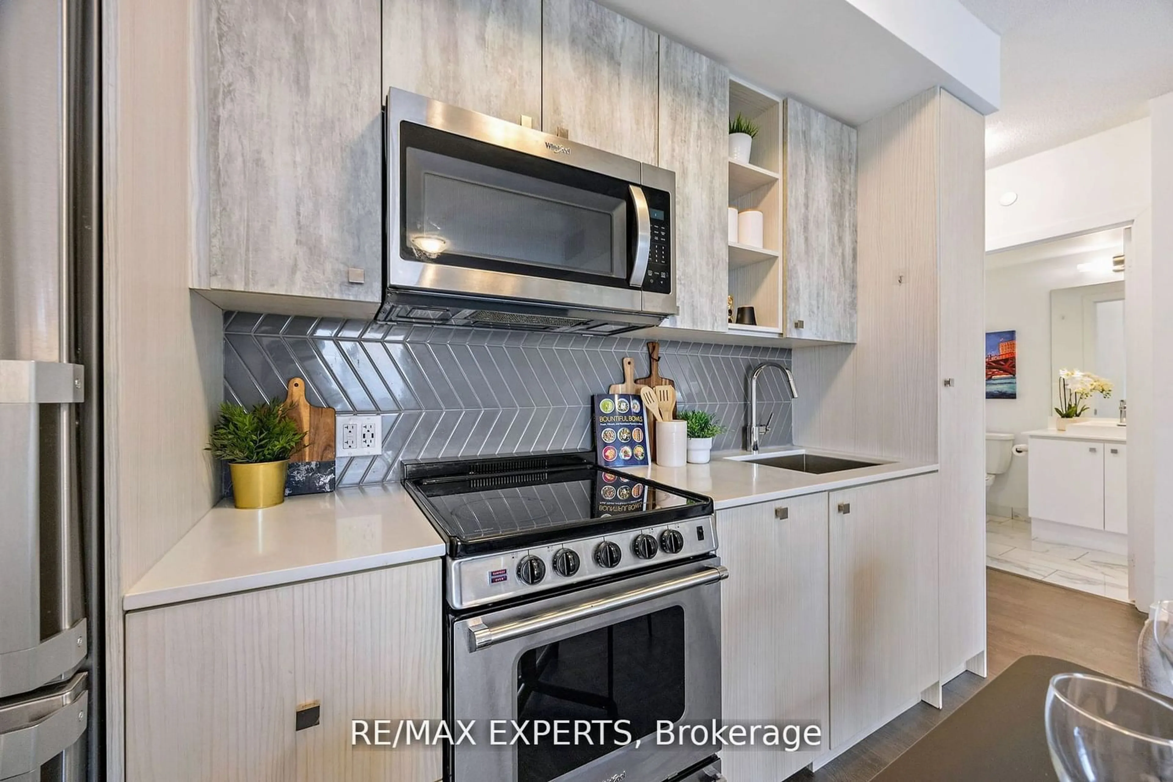 Open concept kitchen, unknown for 251 Manitoba St #1007, Toronto Ontario M8Y 0C7