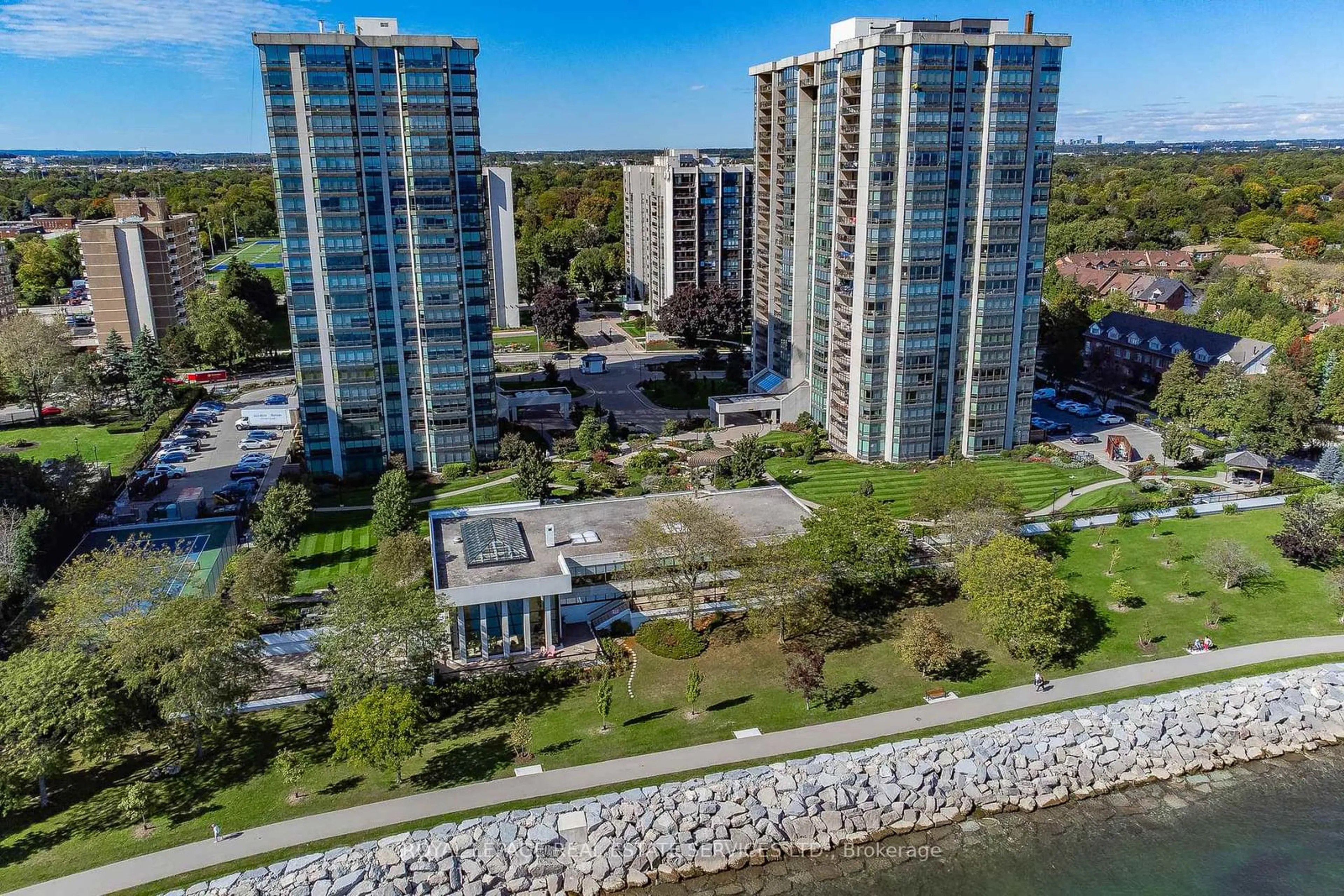 A pic from outside/outdoor area/front of a property/back of a property/a pic from drone, water/lake/river/ocean view for 2170 Marine Dr #207, Oakville Ontario L6L 5V1