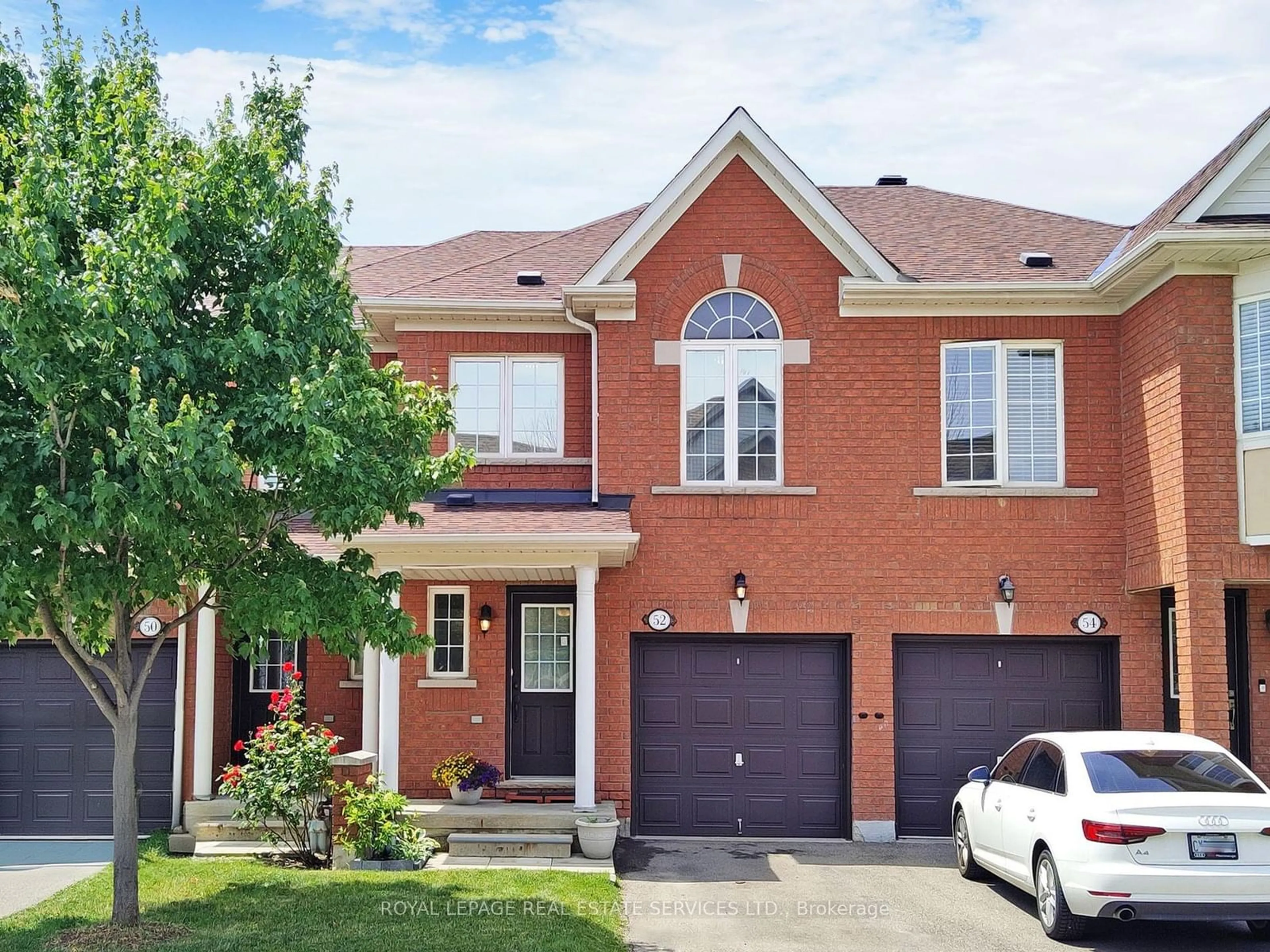 Home with brick exterior material, street for 525 Novo Star Dr #52, Mississauga Ontario L5W 1X8