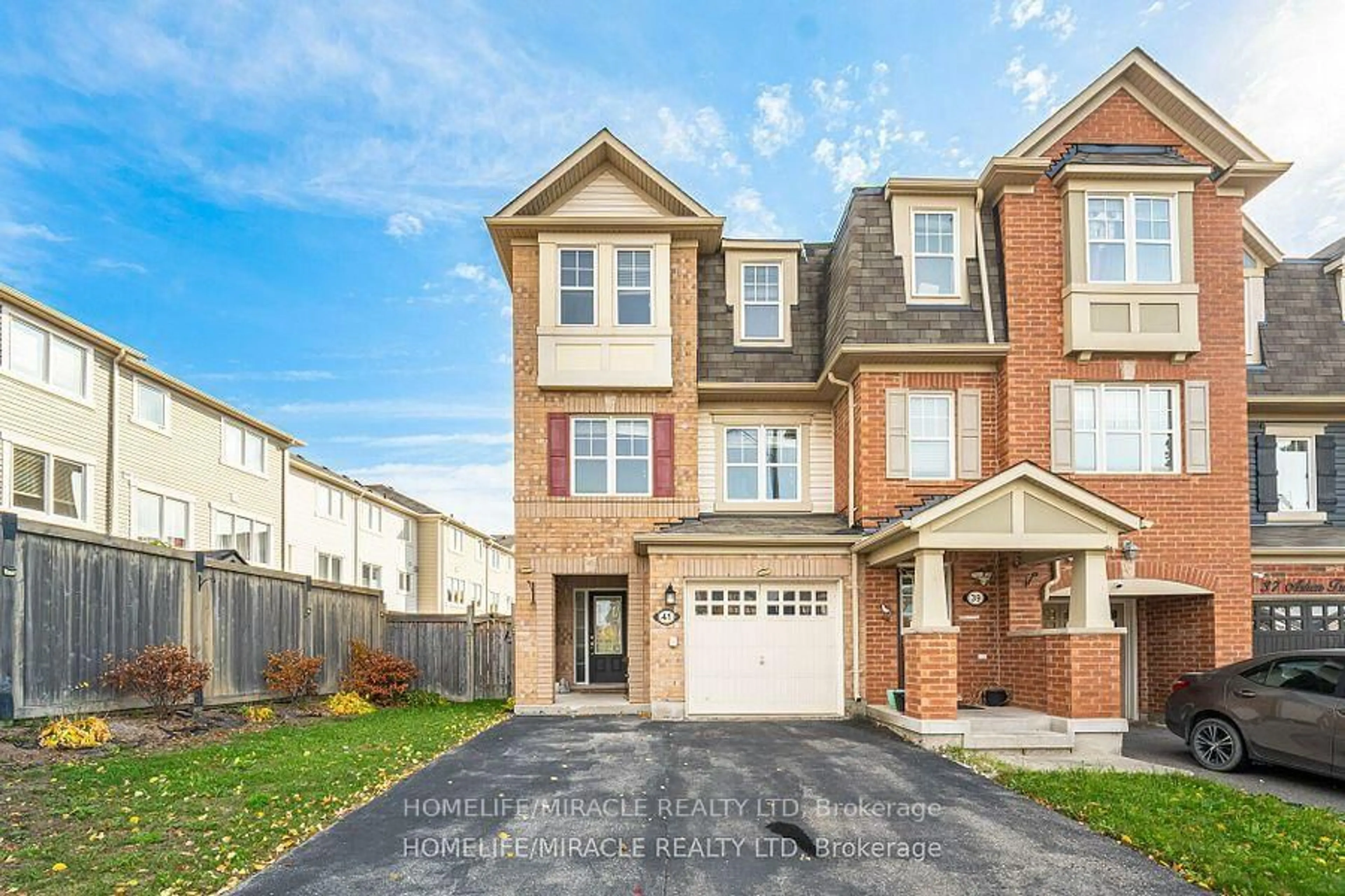 Home with brick exterior material, street for 41 Ashen Tree Lane, Brampton Ontario L7A 0T1