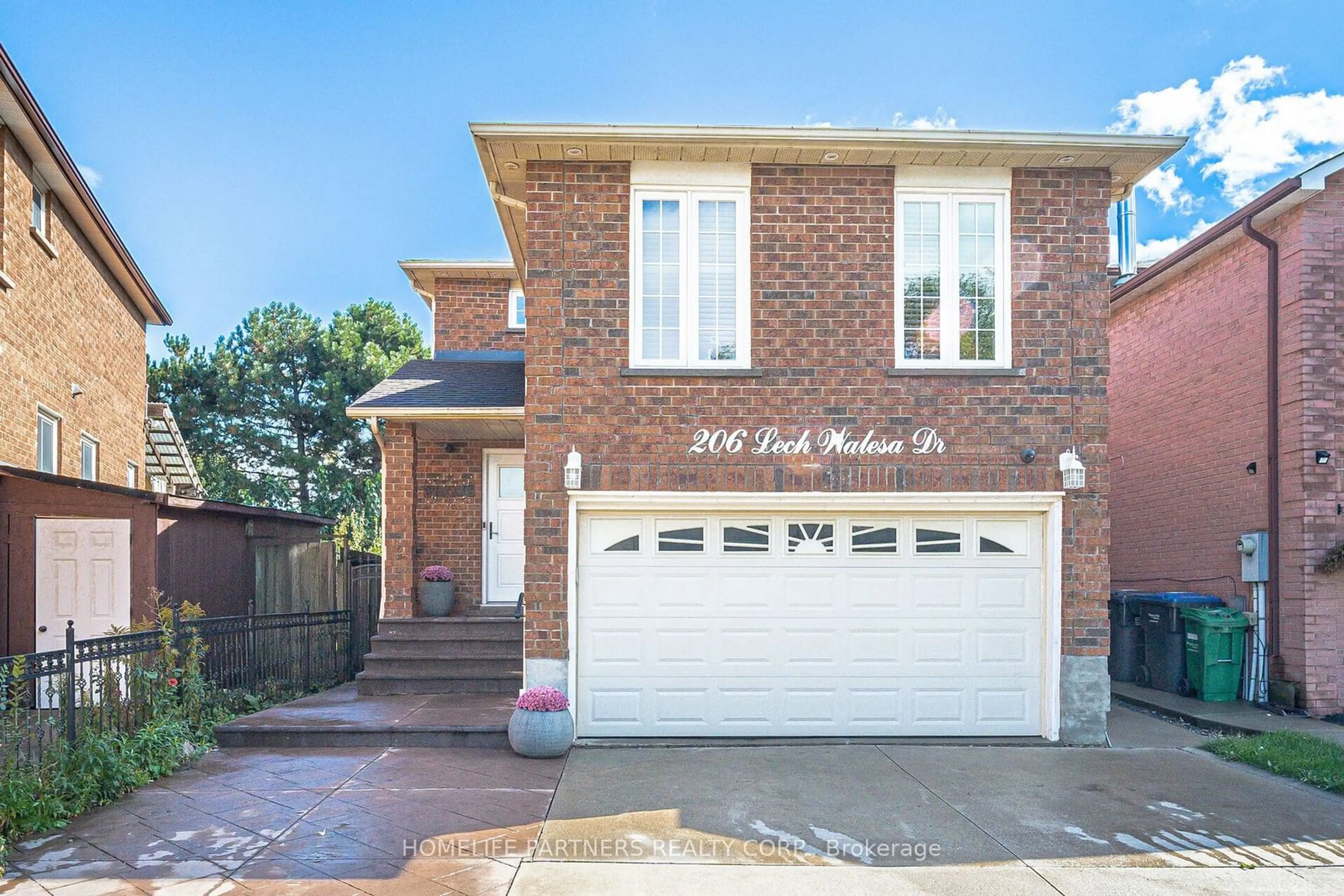 Home with brick exterior material, street for 206 Lech Walesa Dr, Mississauga Ontario L5B 3H7