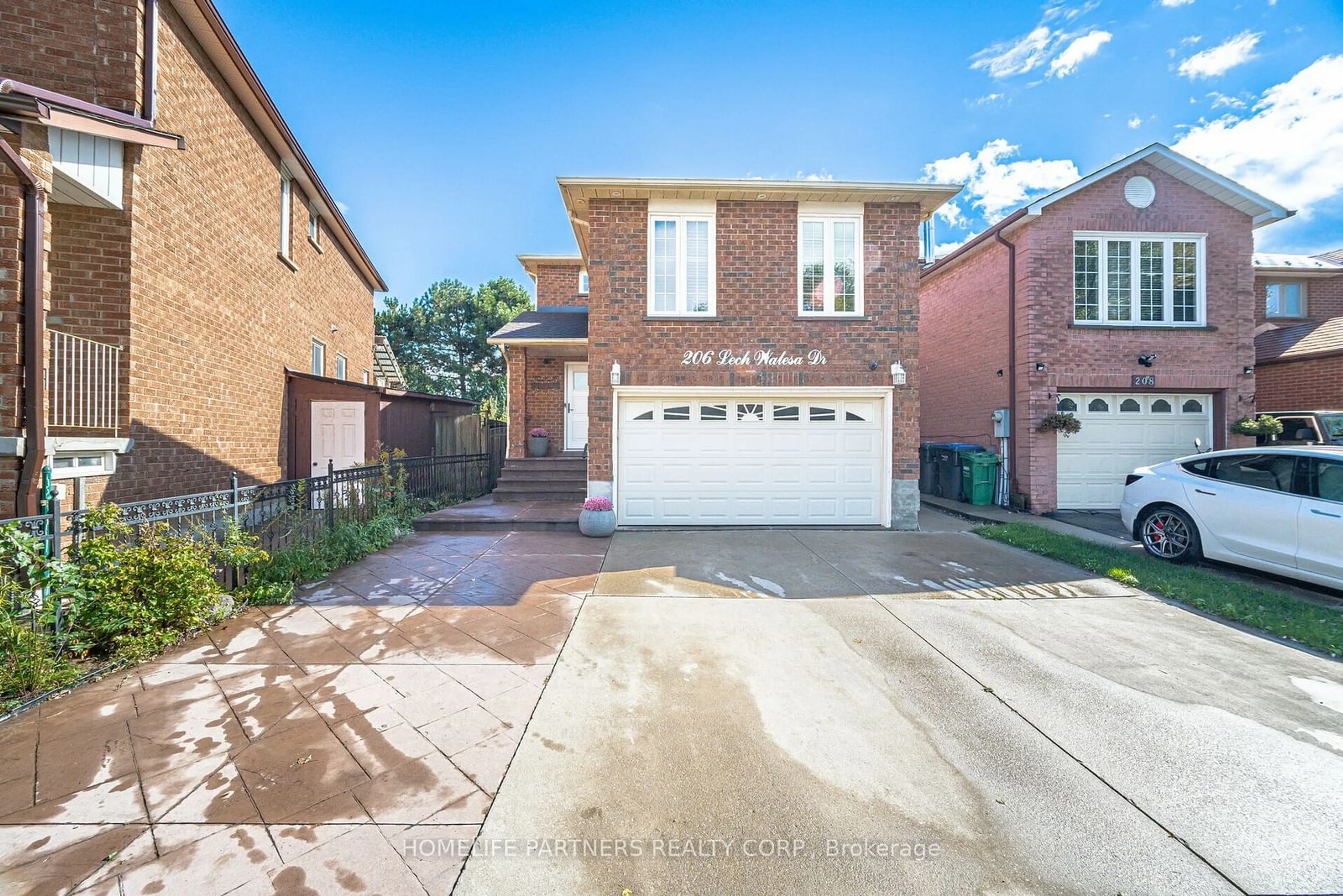 Home with brick exterior material, street for 206 Lech Walesa Dr, Mississauga Ontario L5B 3H7