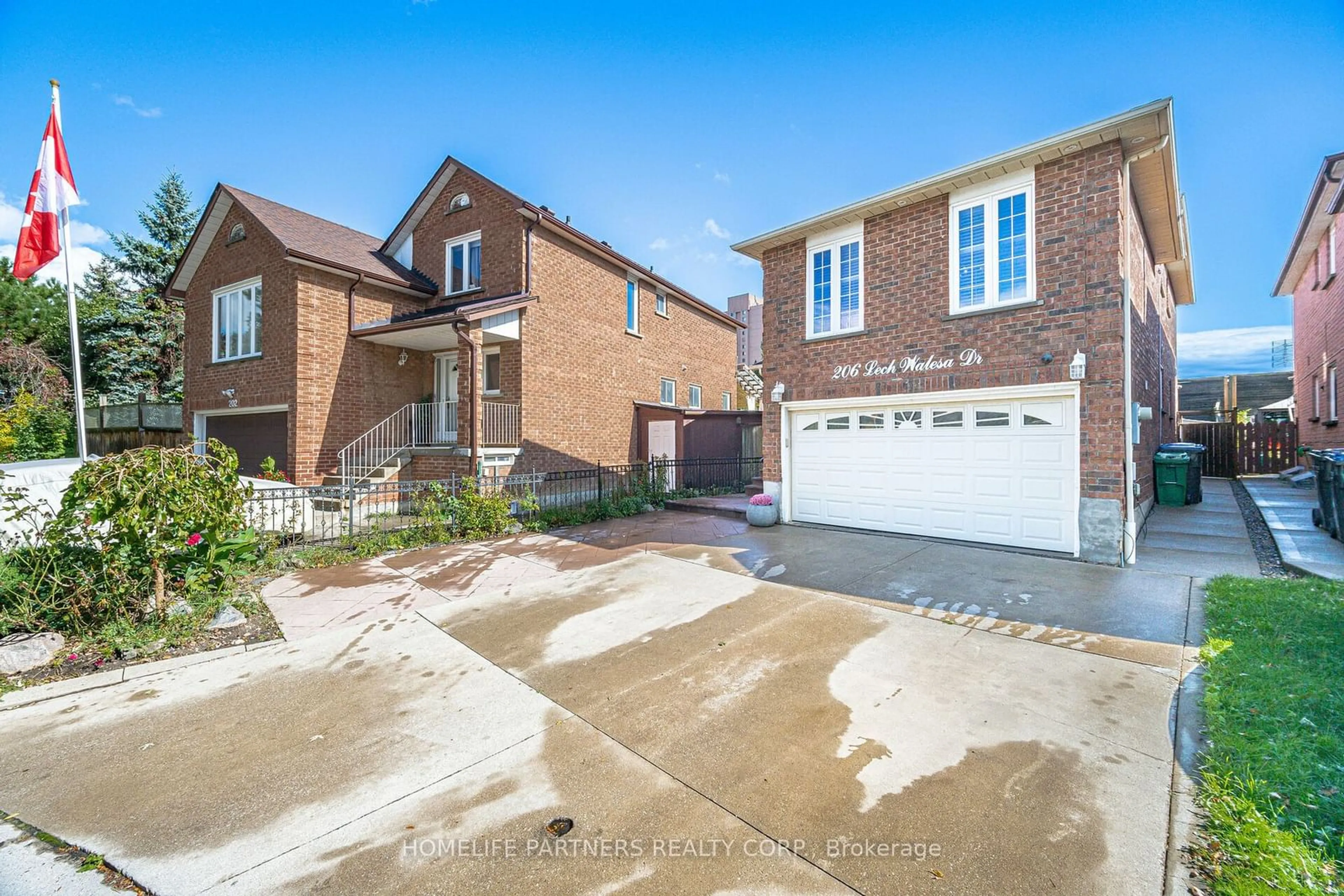 Home with brick exterior material, street for 206 Lech Walesa Dr, Mississauga Ontario L5B 3H7