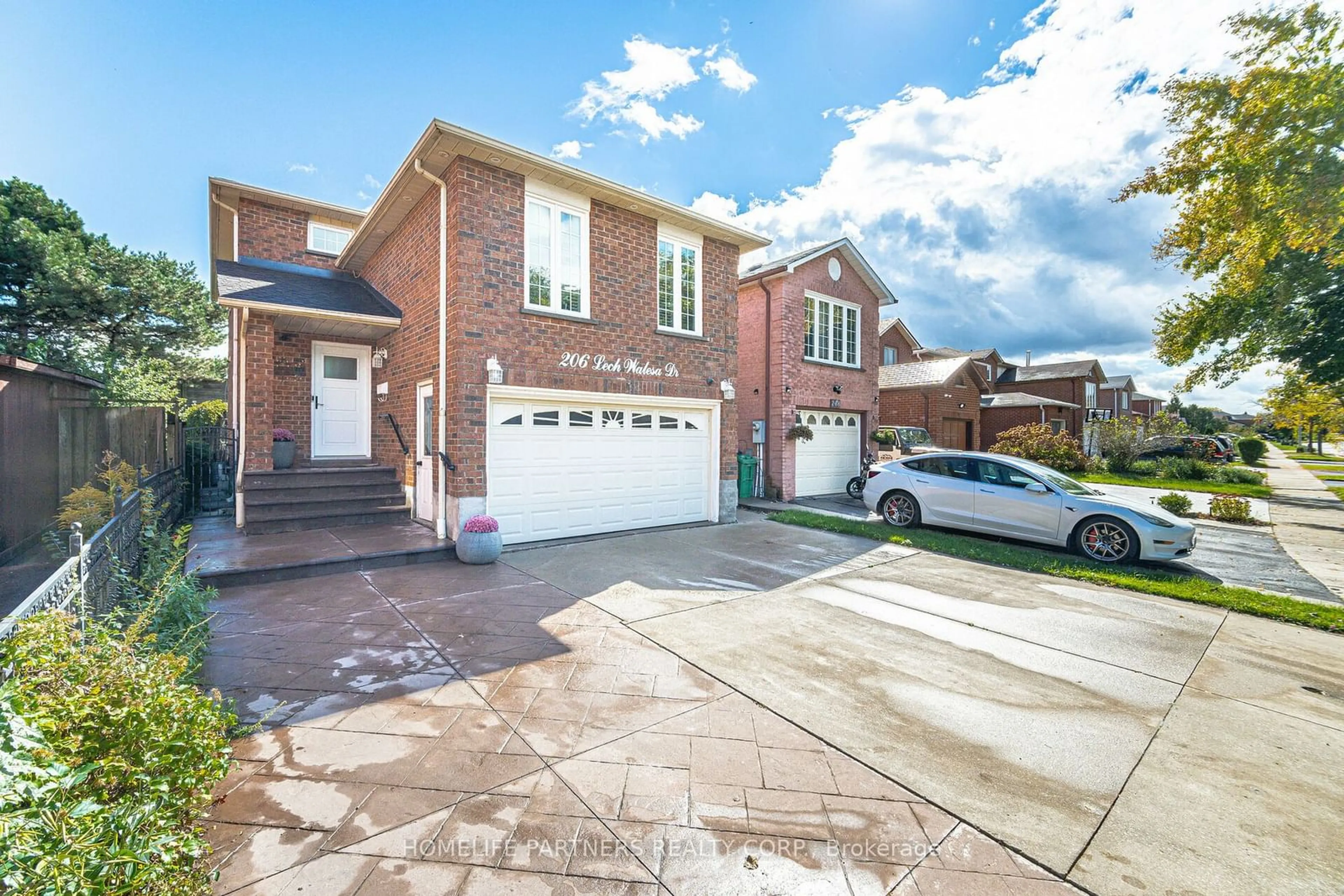 Home with brick exterior material, street for 206 Lech Walesa Dr, Mississauga Ontario L5B 3H7