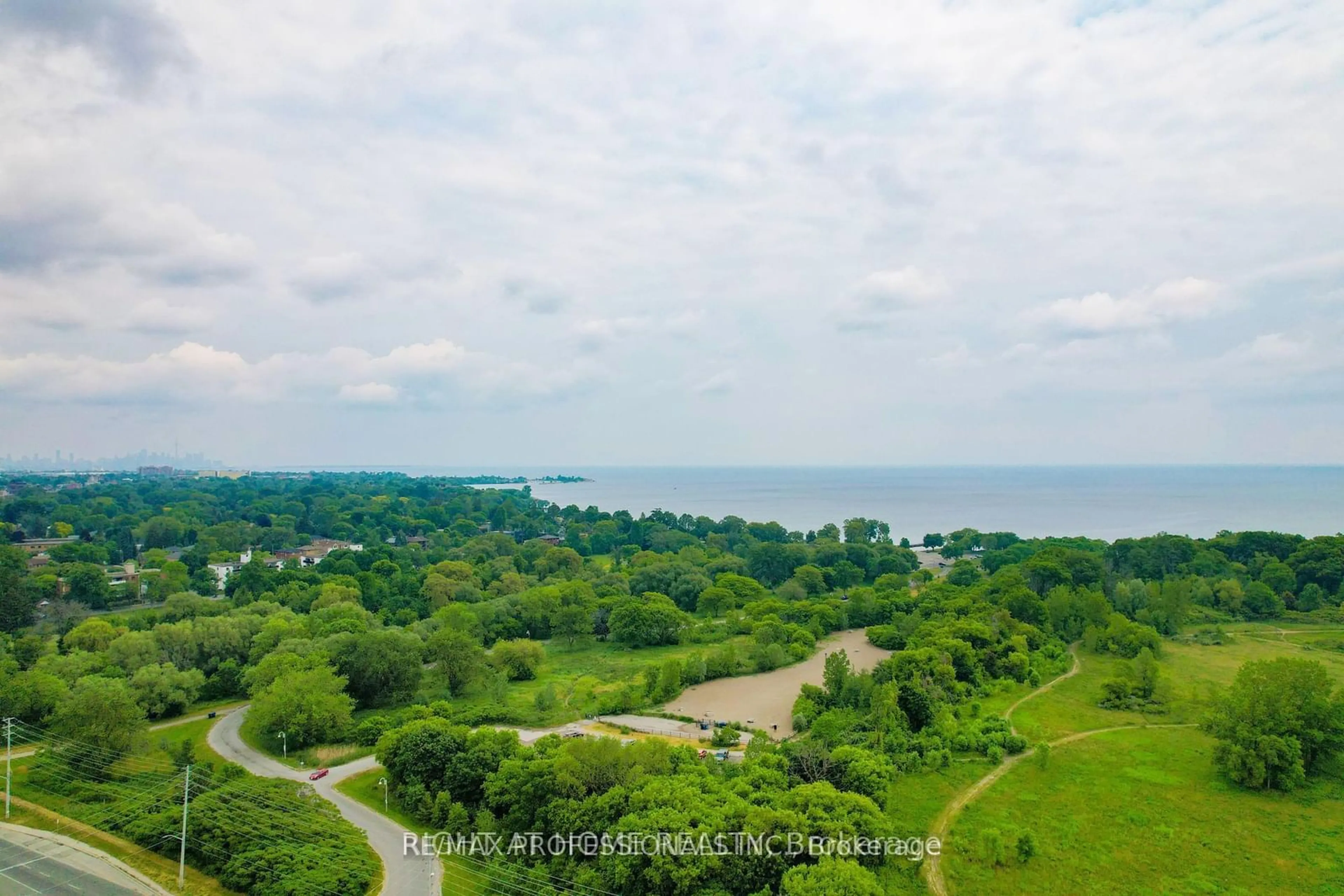 A pic from outside/outdoor area/front of a property/back of a property/a pic from drone, water/lake/river/ocean view for 1485 Lakeshore Rd #304, Mississauga Ontario L5E 3G2