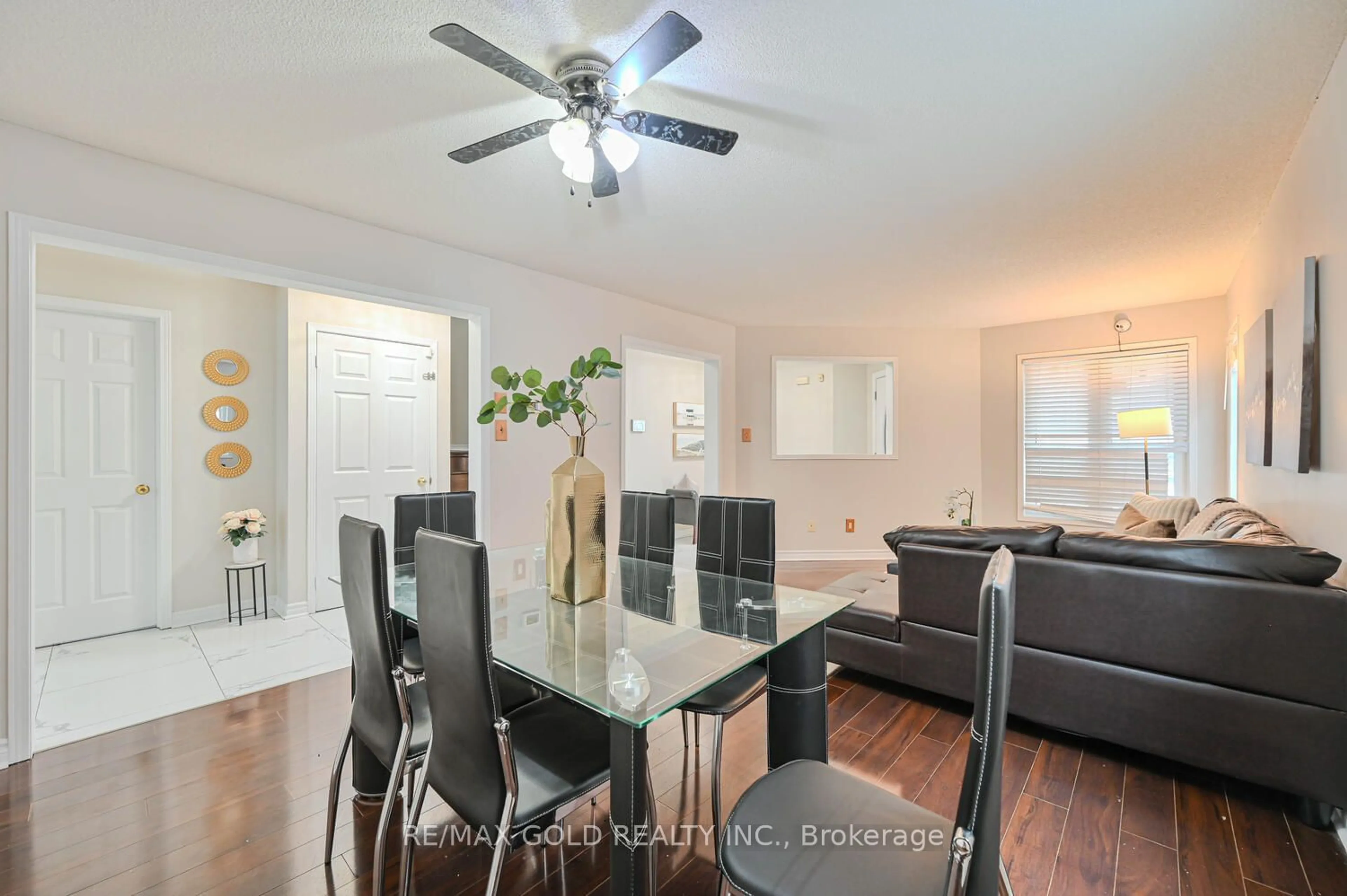 Dining room, wood/laminate floor for 27 Buttercup Lane, Brampton Ontario L6R 1M9