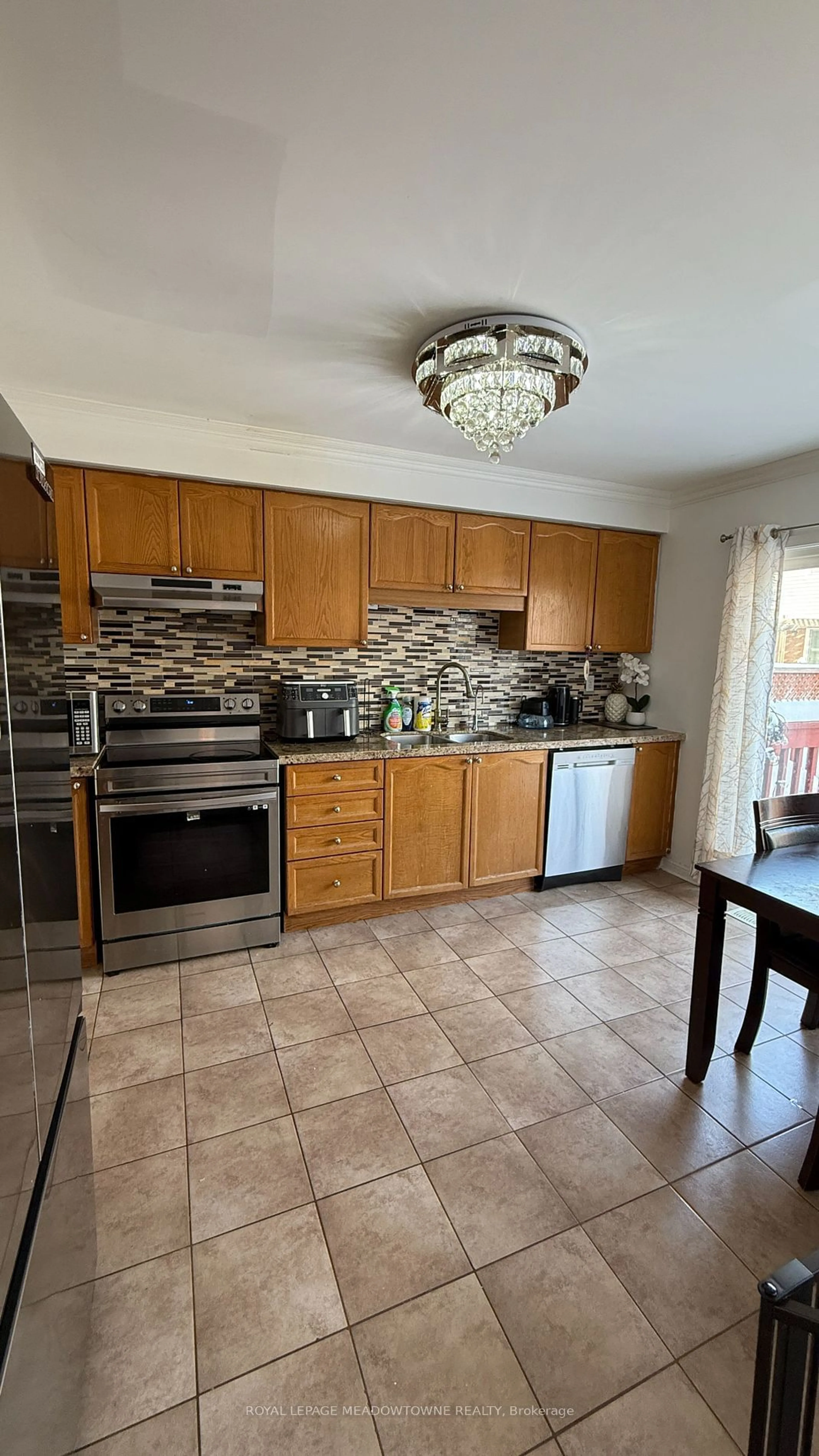 Open concept kitchen, ceramic/tile floor for 433 Baverstock Cres, Milton Ontario L9T 5K7