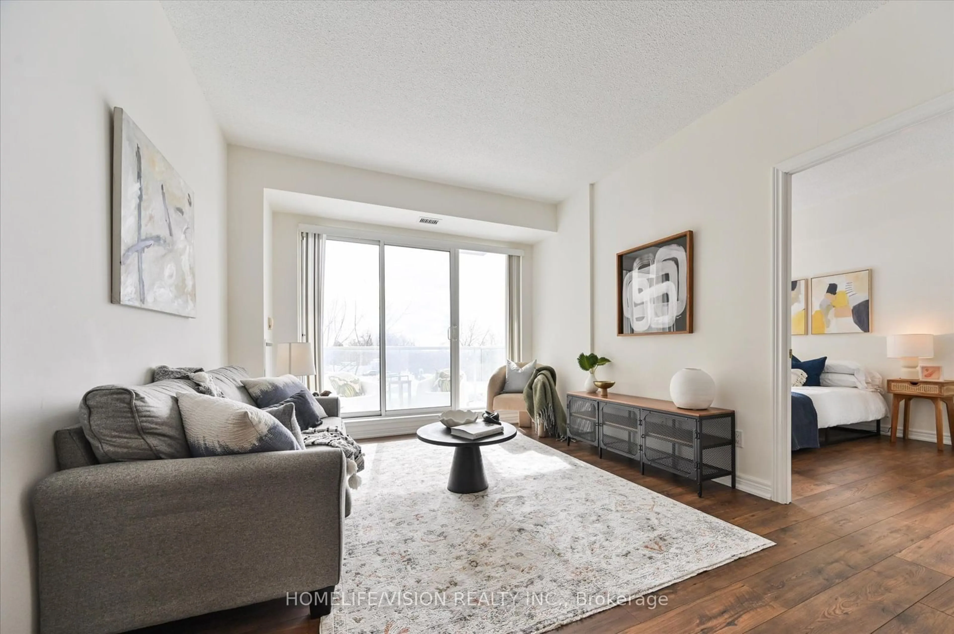 Living room with furniture, unknown for 350 Mill Rd #308, Toronto Ontario M9C 5R7