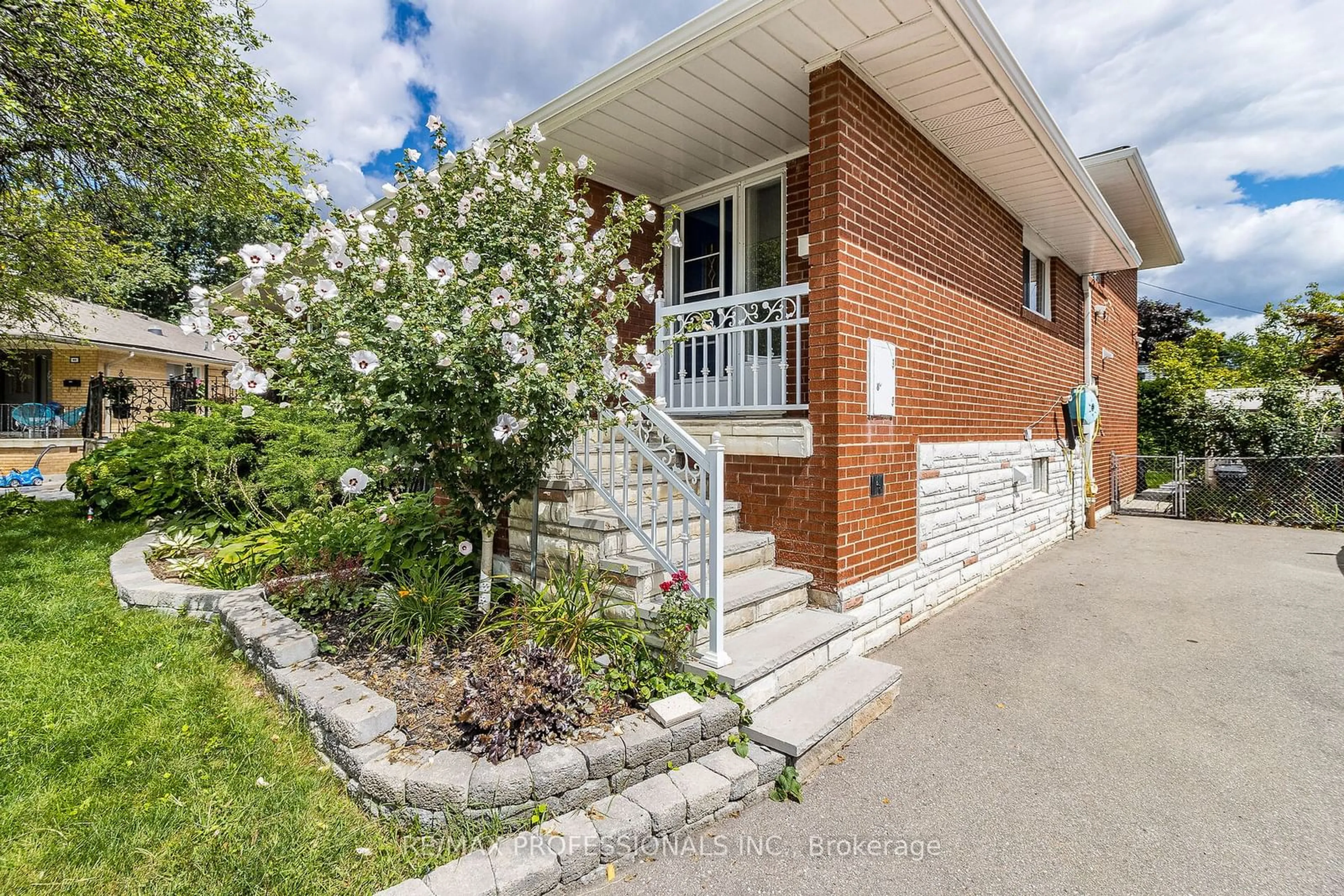 Home with brick exterior material, street for 59 Vanguard Dr, Toronto Ontario M9B 5E8