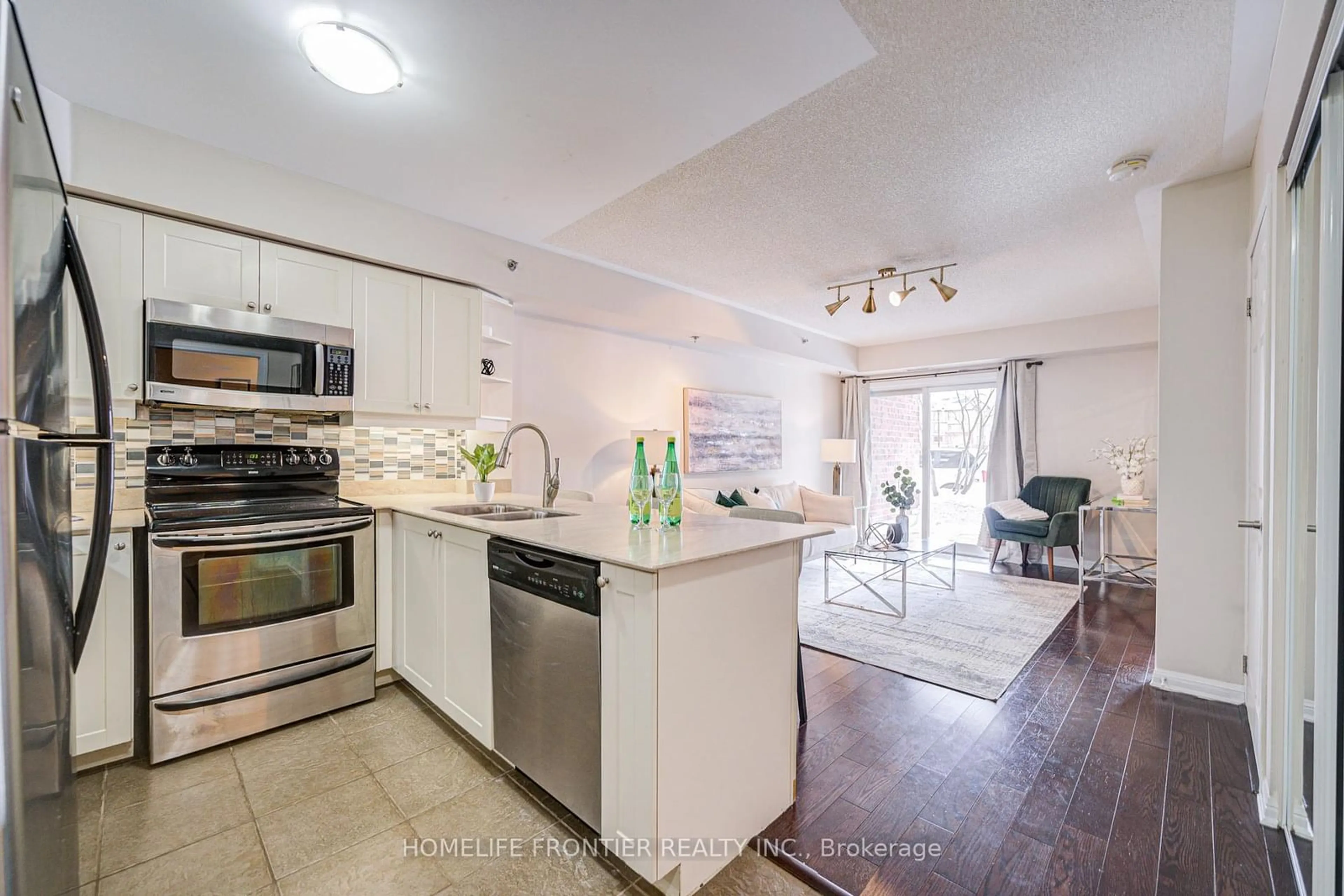 Open concept kitchen, ceramic/tile floor for 3060 Rotary Way #102, Burlington Ontario L7M 0G9