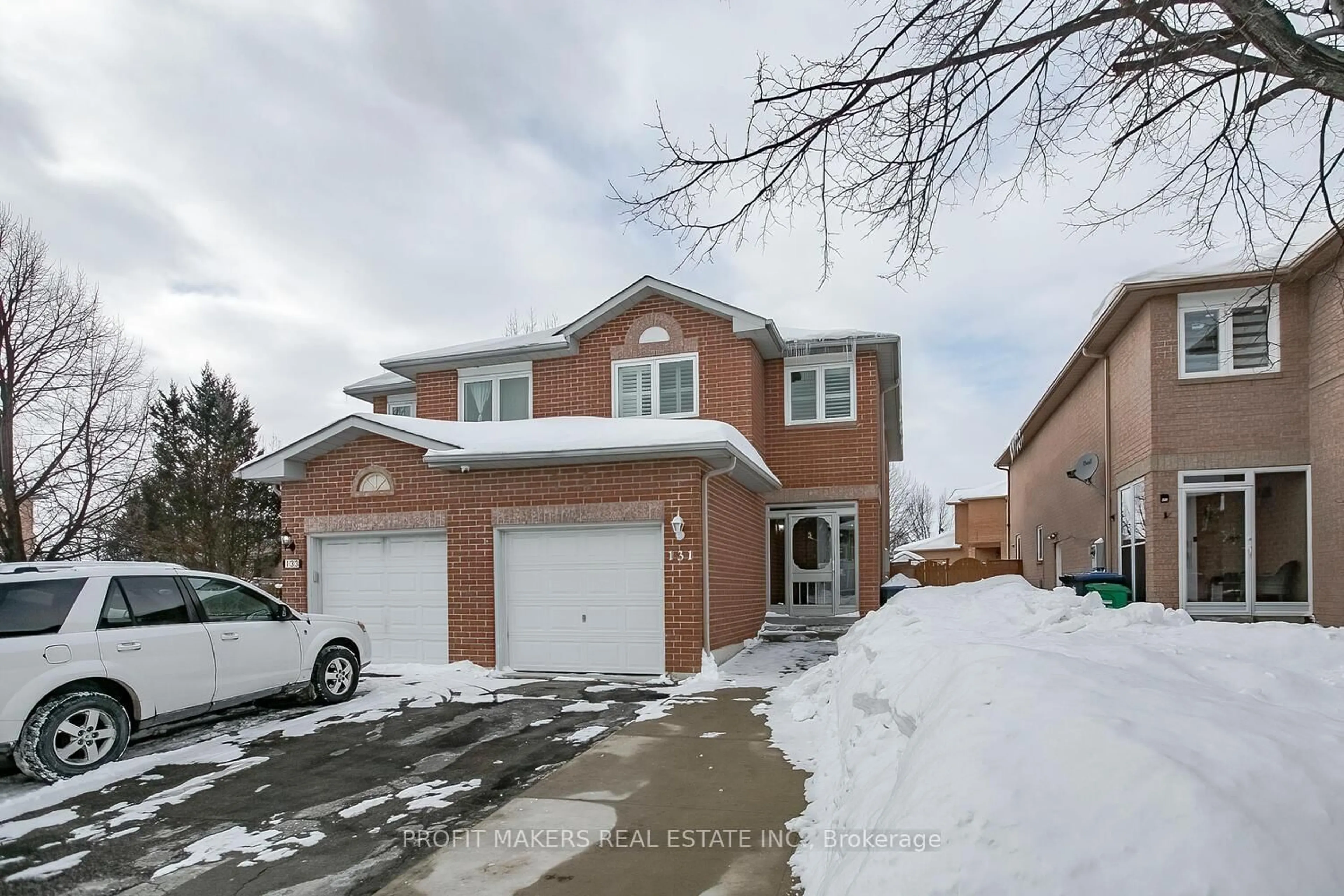 Home with brick exterior material, street for 131 Saddletree Tr, Brampton Ontario L6X 4M9