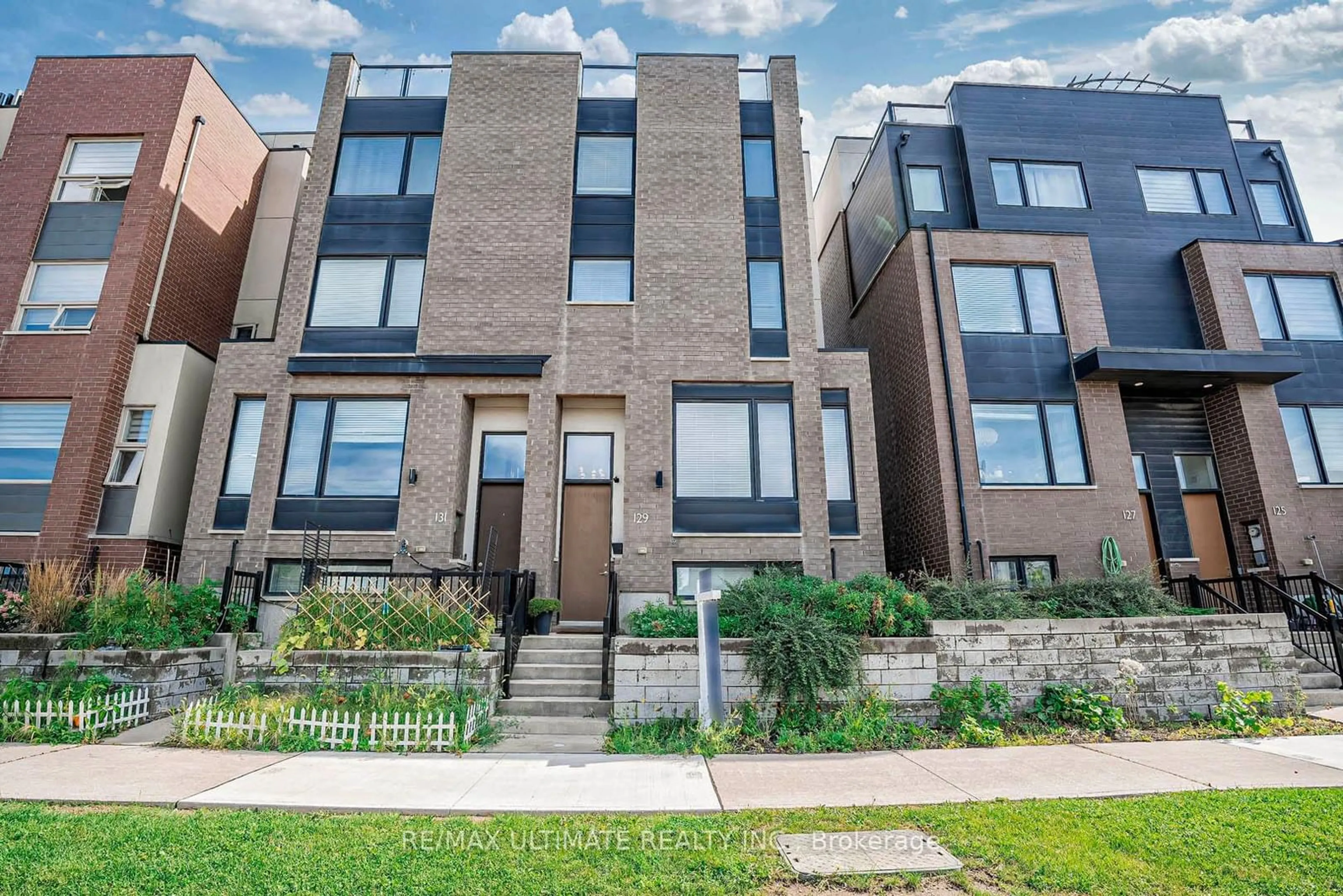 Home with brick exterior material, street for 129 Stanley Greene Blvd, Toronto Ontario M3K 0A7