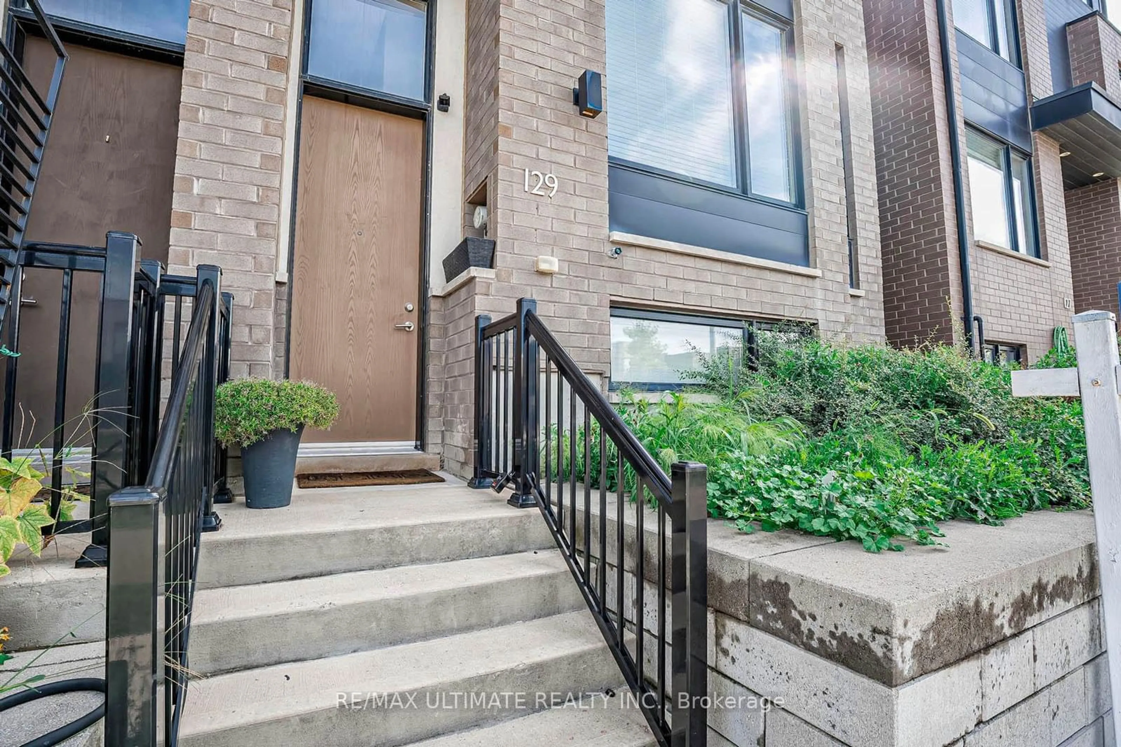 Home with brick exterior material, street for 129 Stanley Greene Blvd, Toronto Ontario M3K 0A7