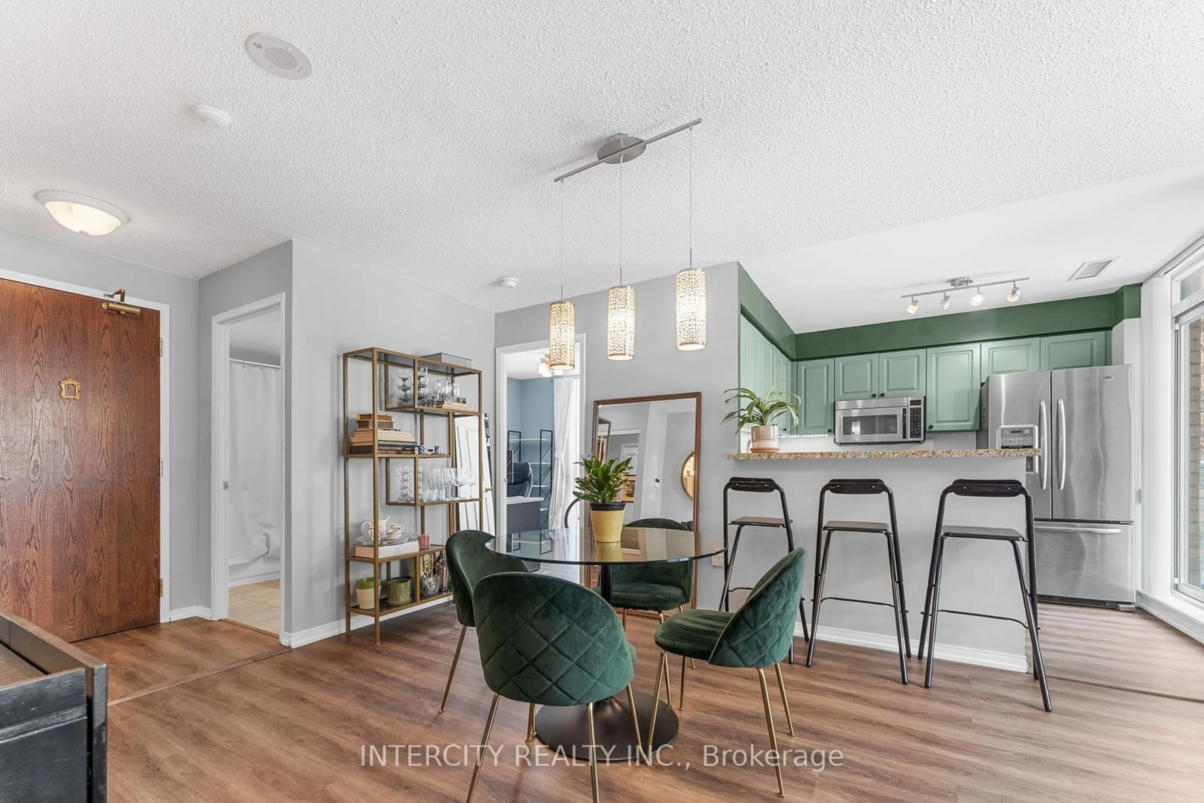 Open concept kitchen, wood/laminate floor for 17 Michael Power Pl #413, Toronto Ontario M9A 5G5