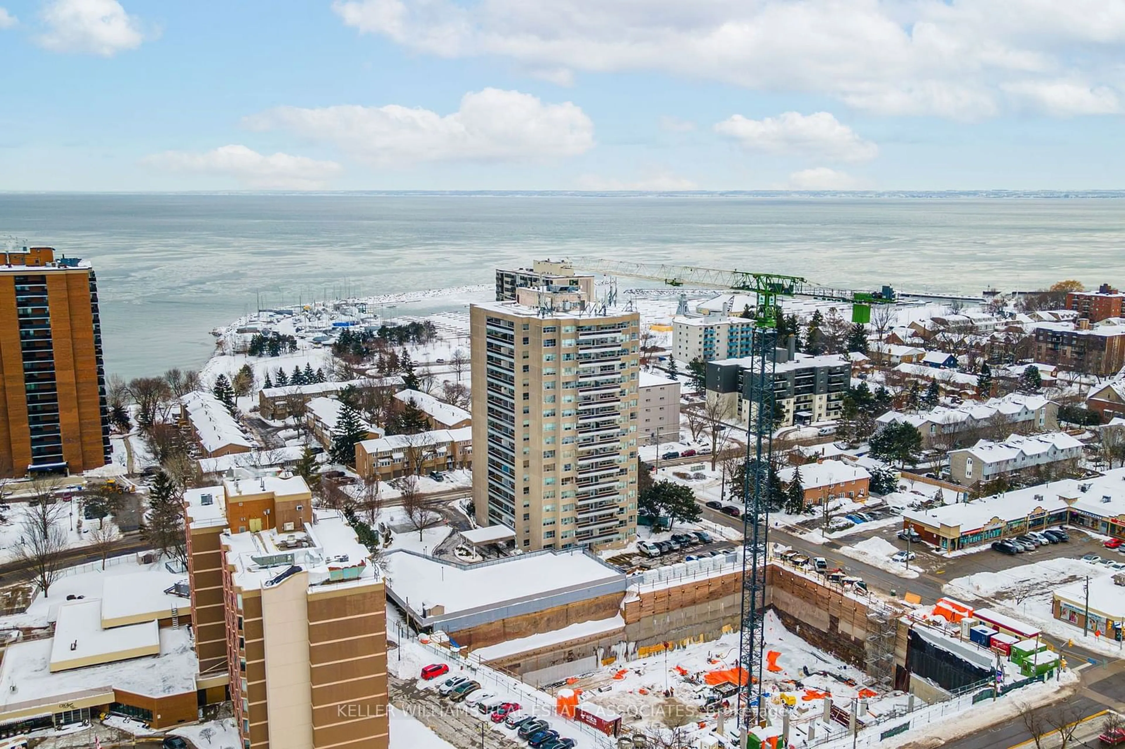 A pic from outside/outdoor area/front of a property/back of a property/a pic from drone, city buildings view from balcony for 2263 Marine Dr #705, Oakville Ontario L6L 5K1