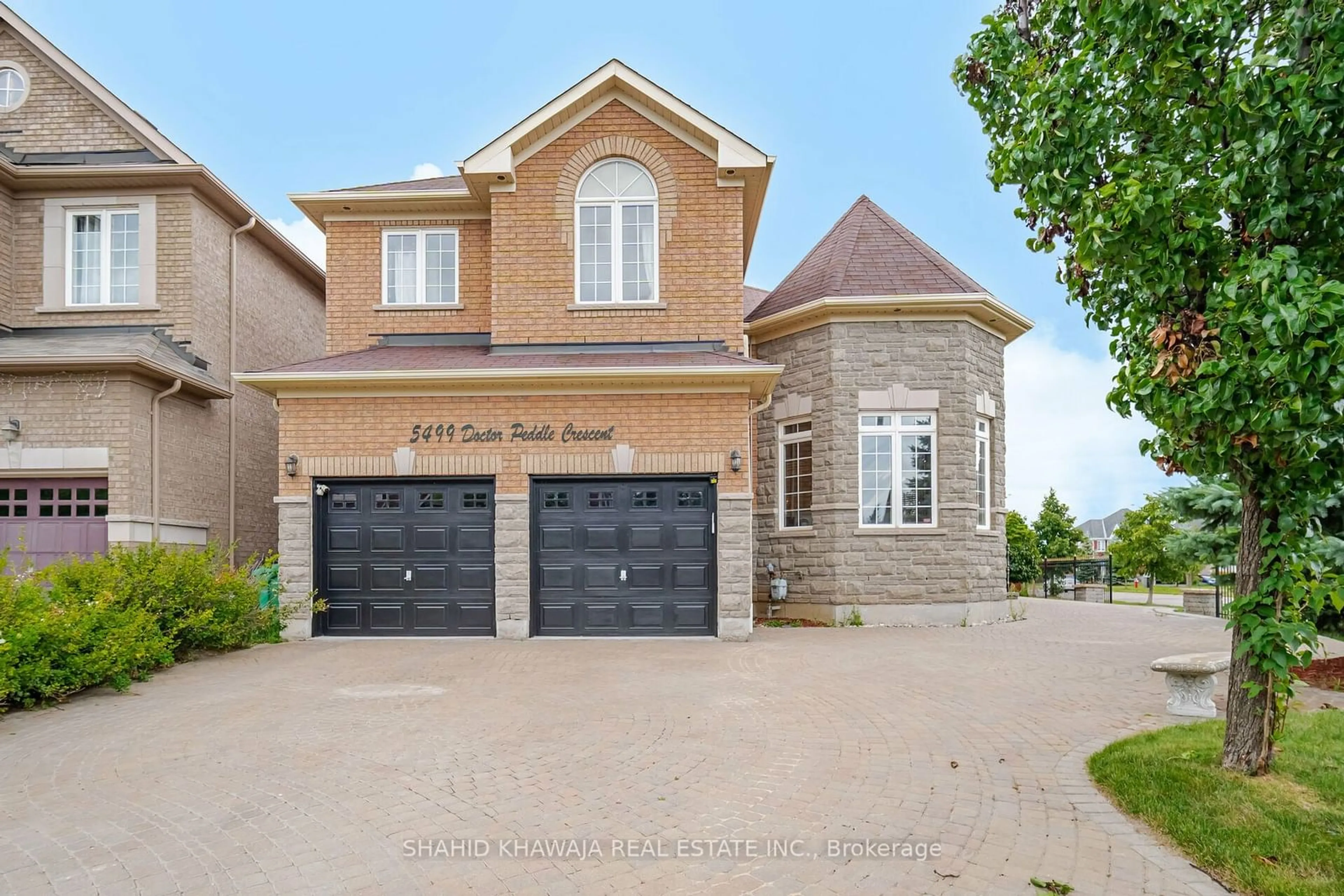 Home with brick exterior material, street for 5499 Doctor Peddle Cres, Mississauga Ontario L5M 0K7