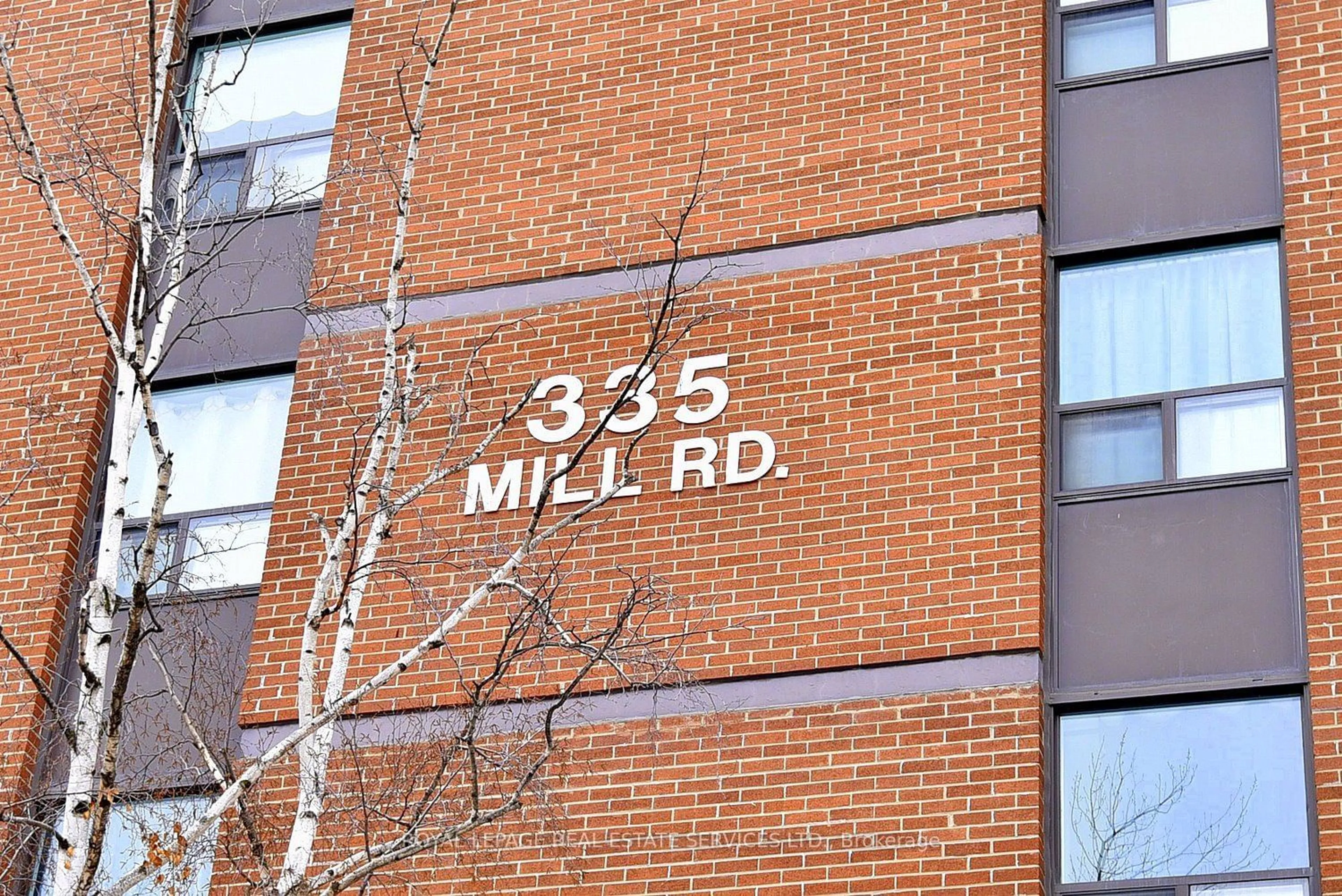 Home with brick exterior material, building for 335 Mill Rd #303, Toronto Ontario M9C 1Y6